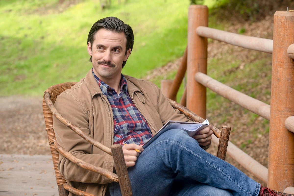 Milo Ventimiglia as Jack Pearson, sitting outside in a chair