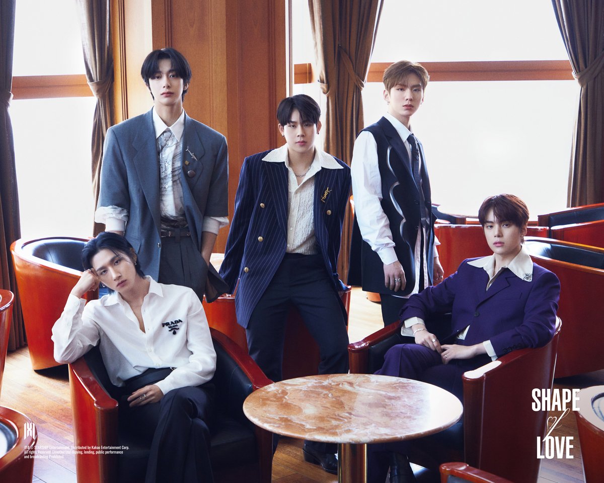 Monsta X, who are currently on their No Limit tour, pose for a promotional photograph.