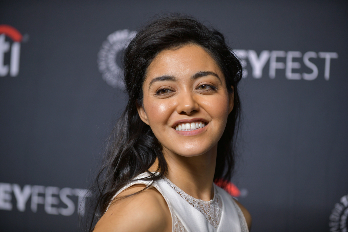 ‘NCIS: Hawai’i’ Yasmine Al-Bustami smiles in a close-up photo as she attends a salute to the NCIS universe during the 39th Annual PaleyFest LA at Dolby Theatre on April 10, 2022 in Hollywood, California