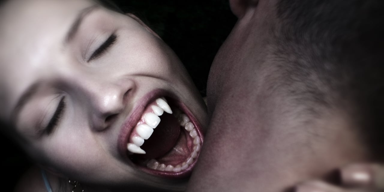 Gracie Dzienny bites the neck of a man in episode 6 of the first season of 'First Kill,' new on Netflix on June 10, 2022.