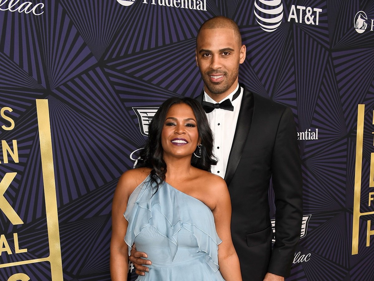 Nia Long and Ime Udoka, who each have a sizeable net worth, smile on the carpet at BET Presents the American Black Film Festival Honors