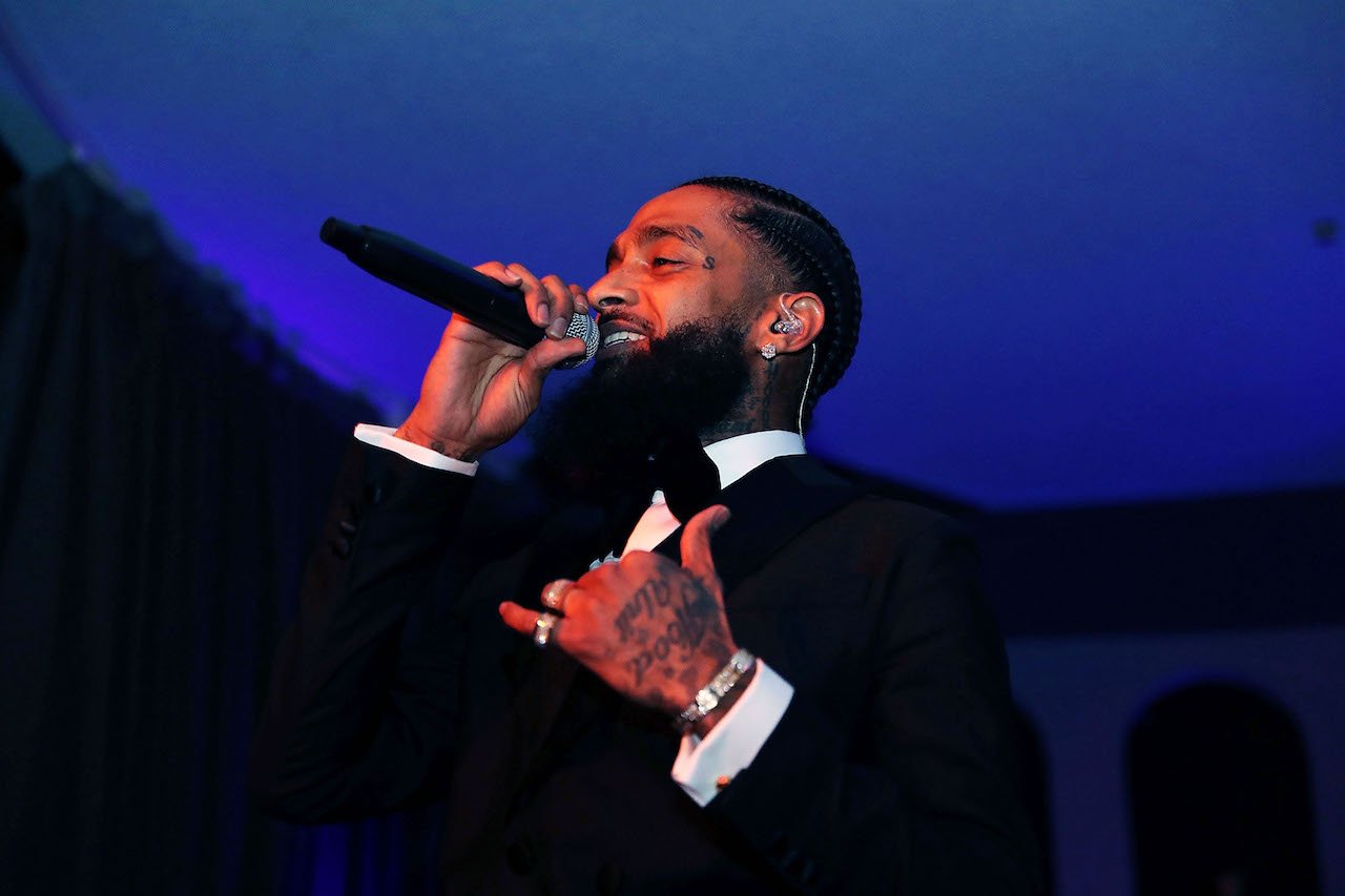 Nipsey Hussle on stage; a new YouTube documentary focuses on Hussle's business side