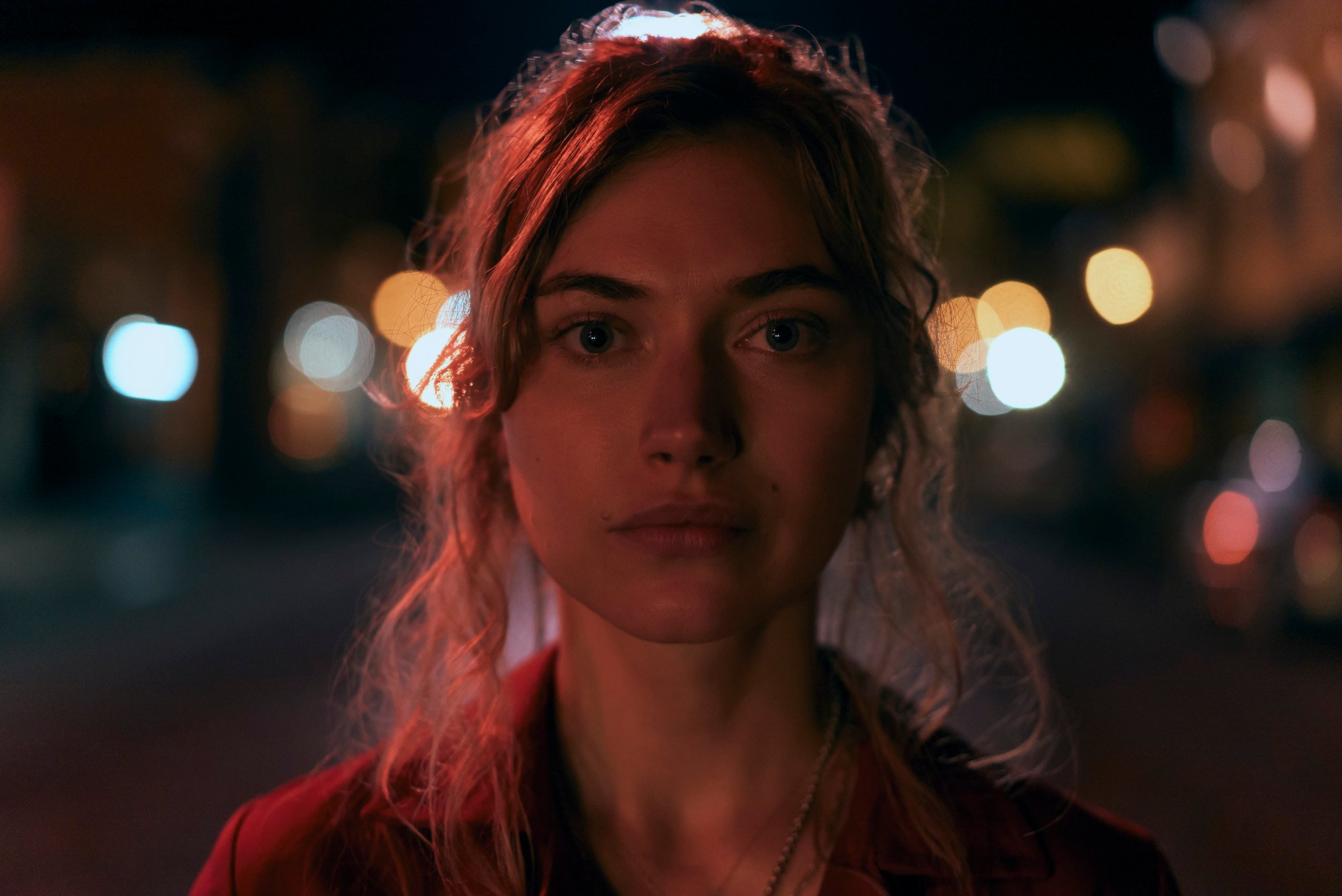 'Outer Range' star Imogen Poots stares in to the camera in a production still.