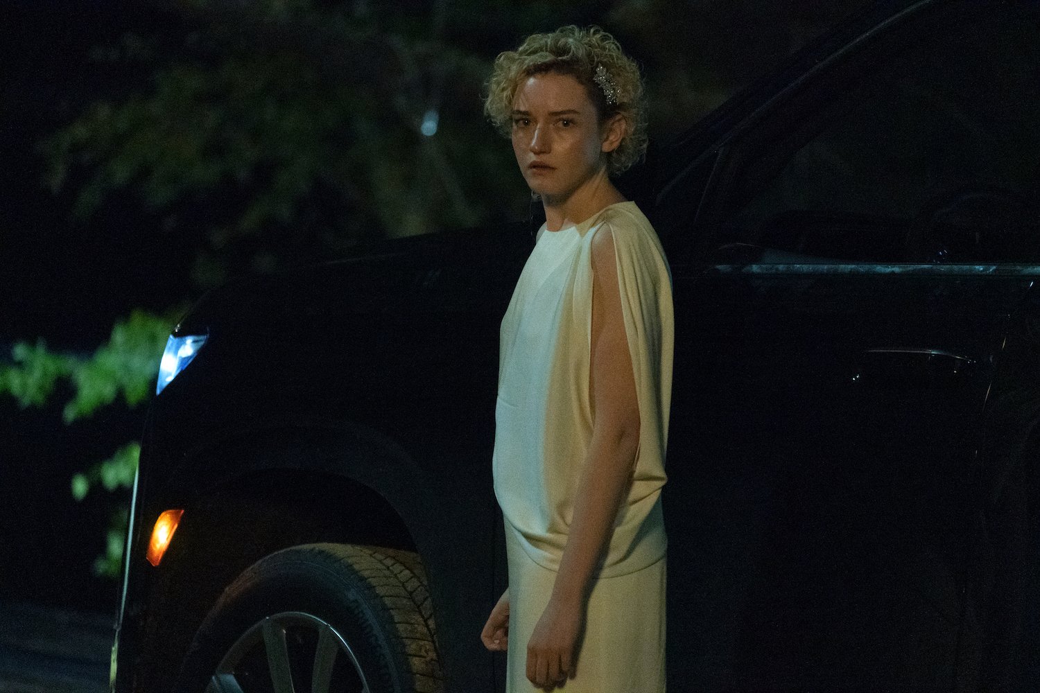 'Ozark' finale production still featuring Julia Garner as Ruth Langmore wearing a white formal dress.