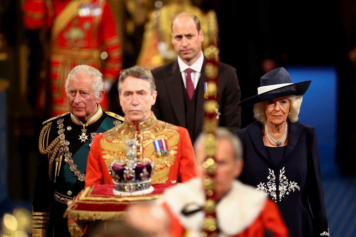 Prince Charles, Prince William, and Camilla Parker Bowles, who is prepared to William in his place if he "abuses" Charles' "generosity," at the ceremonial state opening of Parliament