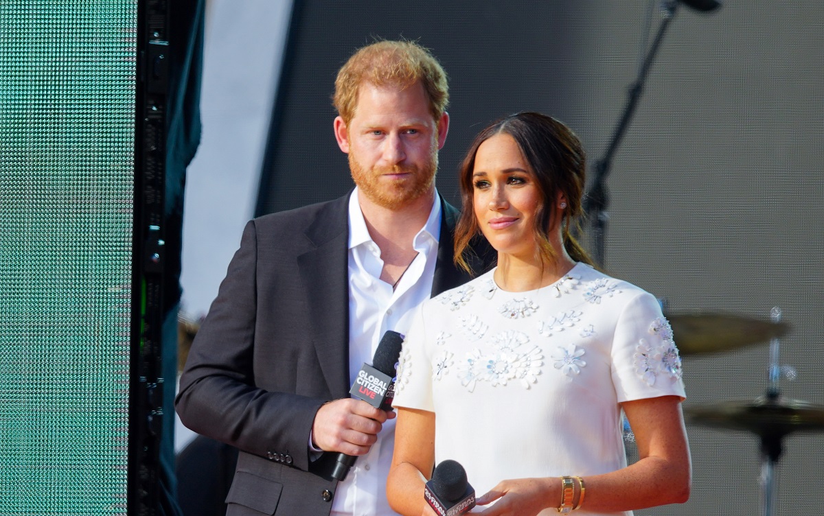 Prince Harry and Meghan Markle, who have been told they 'can't just take the money and run' after Netflix deal, speak on stage at Global Citizen Live New York