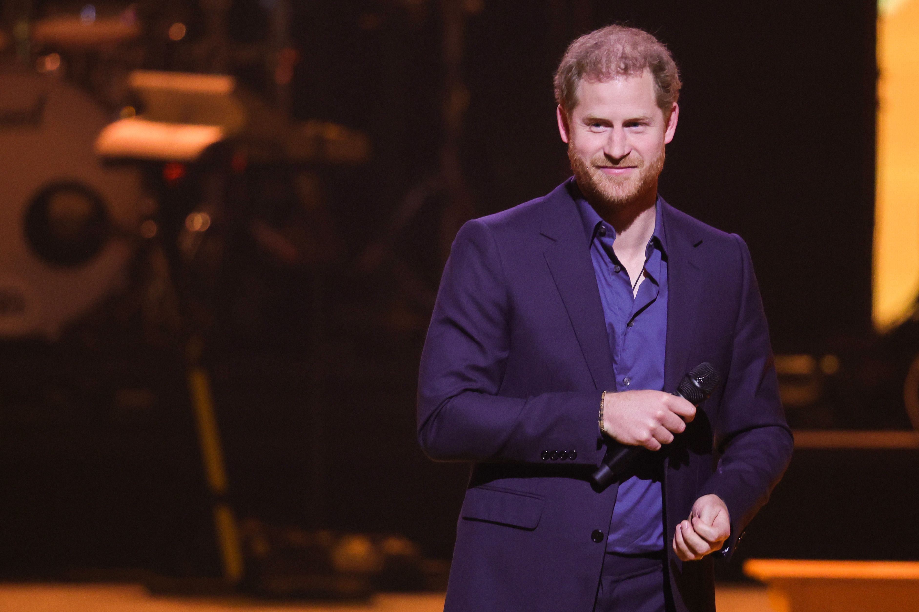 Prince Harry, who signaled he won't be attending the Queen's Platinum Jubliee Celebration, speaks on stage during the Invictus Games Closing Ceremony