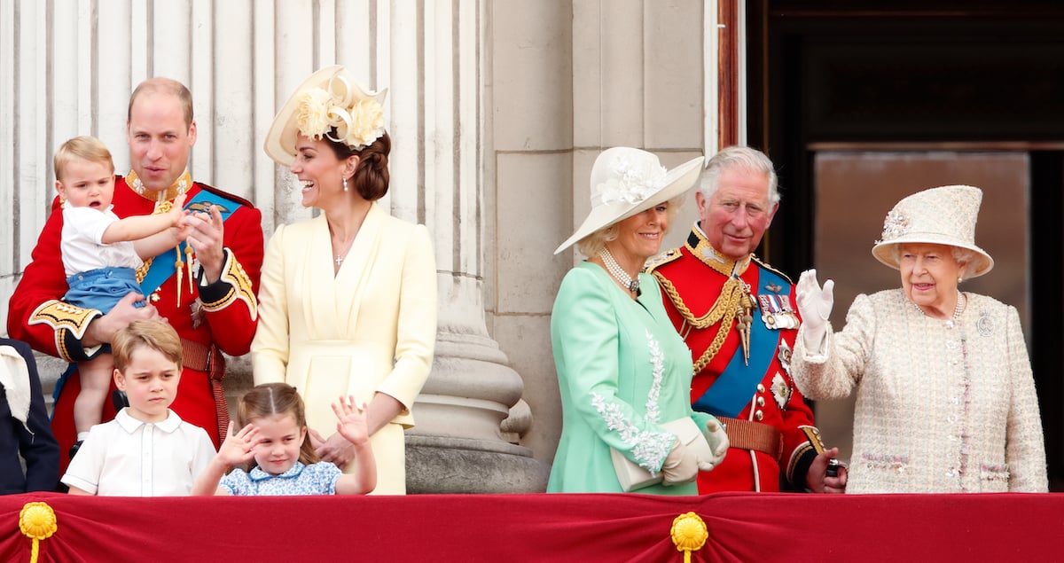 Prince William, Kate Middleton, Prince Louis, Prince George, Princess Charlotte, Camilla Parker Bowles, Prince Charles, and Queen Elizabeth II stand on the balcony of Buckingham Palace during Trooping the Colour