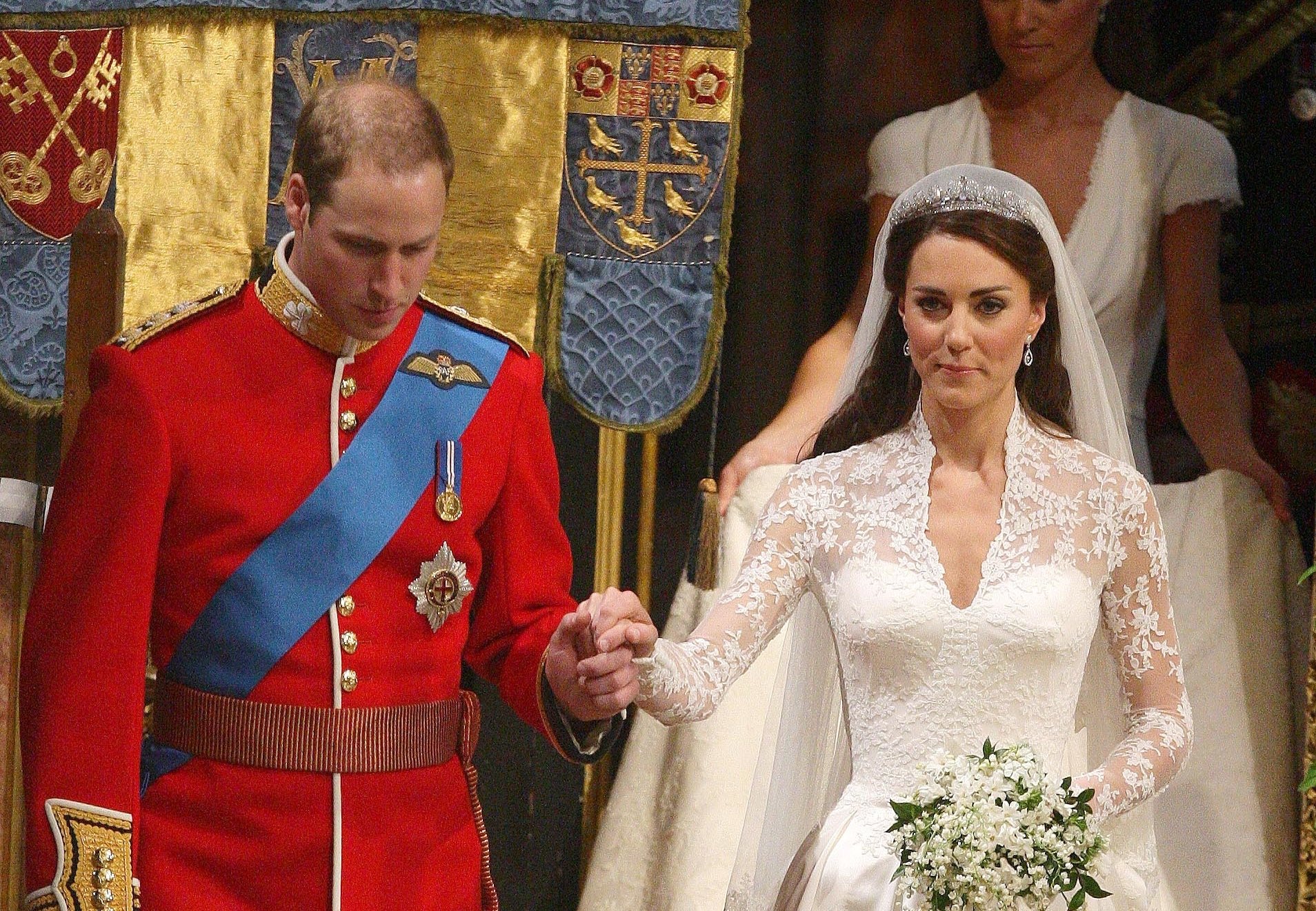 Prince William and Kate Middleton, who was in tears before her wedding, leaving Westminster Abbey after getting married