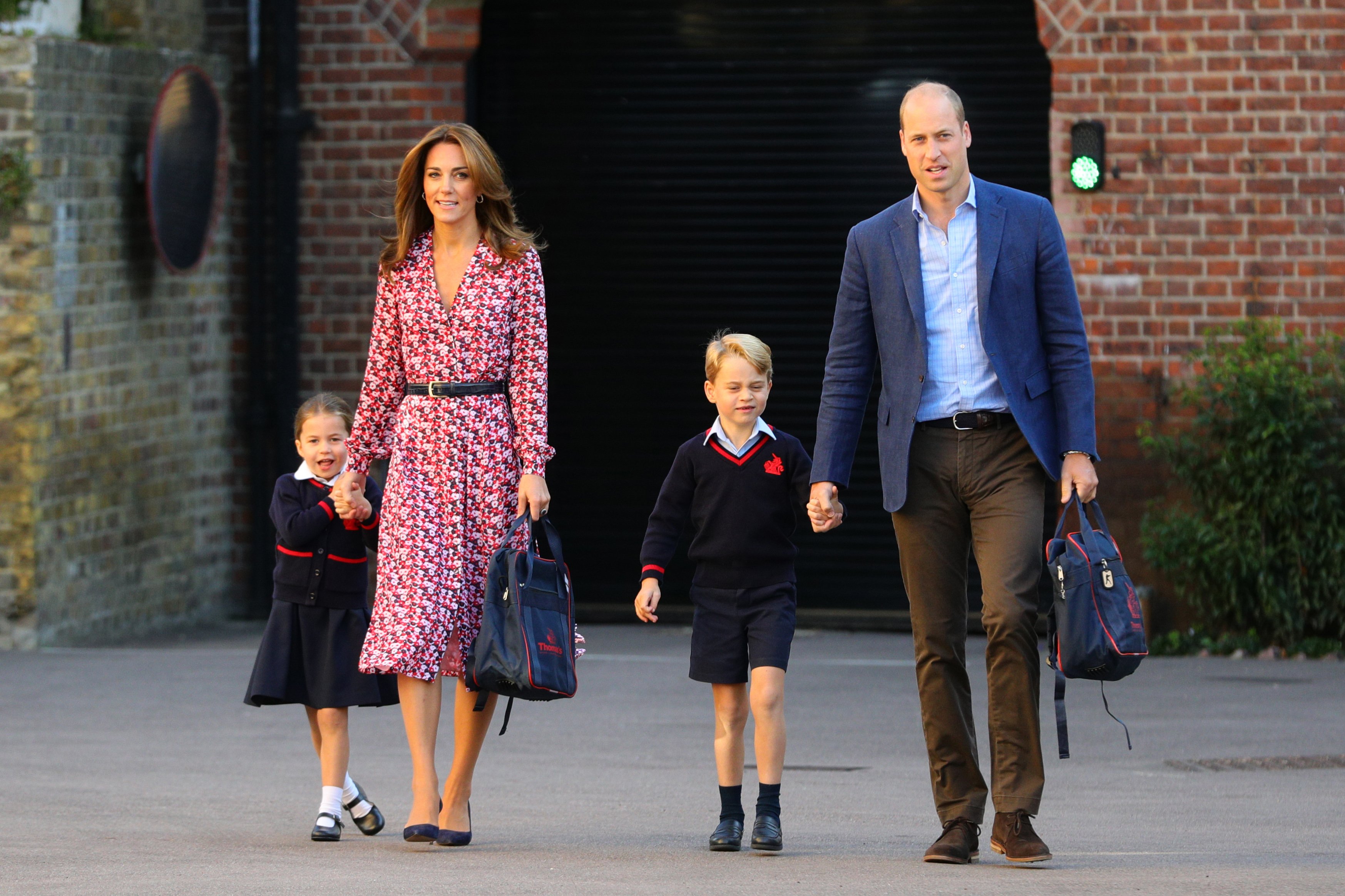 Princess Charlotte and Prince George accompanied by Kate Middleton and Prince William, who once erupted at a photographer trying to take pictures of his children