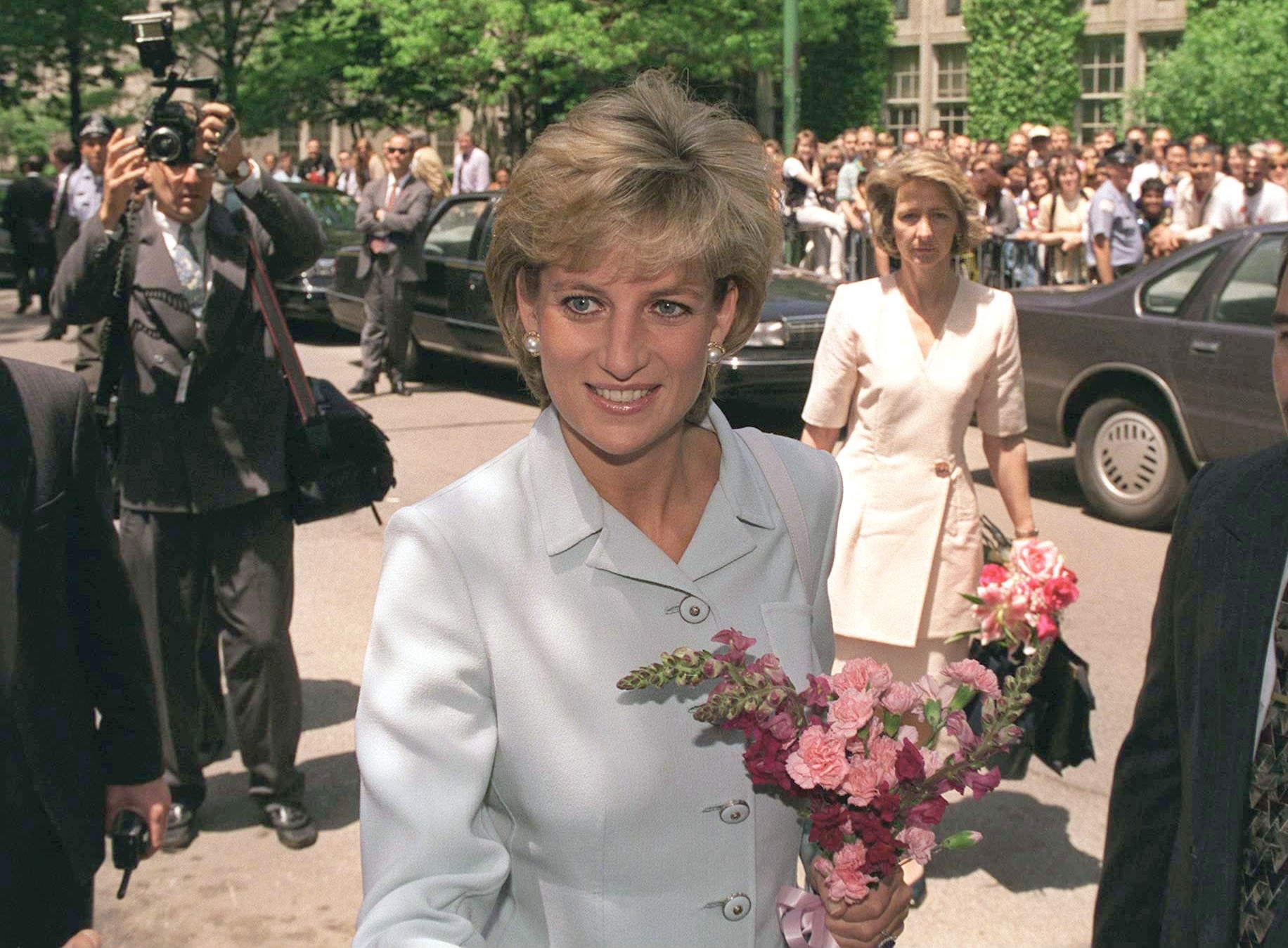 Never-before-seen footage has been shared of Princess Diana who is seen here visiting Cook County Hospital in Chicago