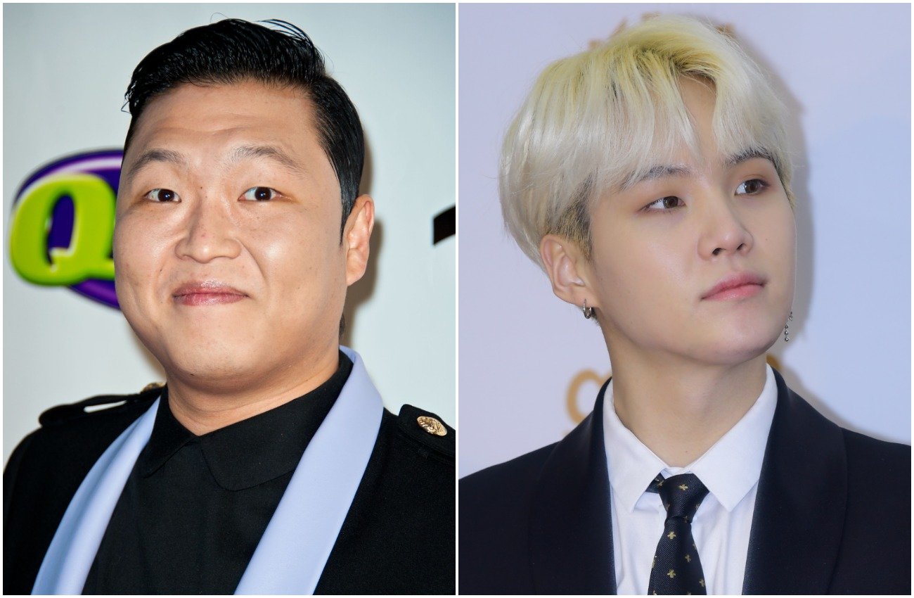 Psy look on at the camera. Suga with blond hair and looking to the left side of the picture
