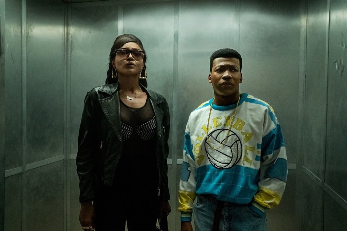 Patina Miller as Raquel ' 'Raq' Thomas and Mekai Curtis as Kanan Stark stand together in an elevator in a scene from 'Power Book III: Raising Kanan' Season 2