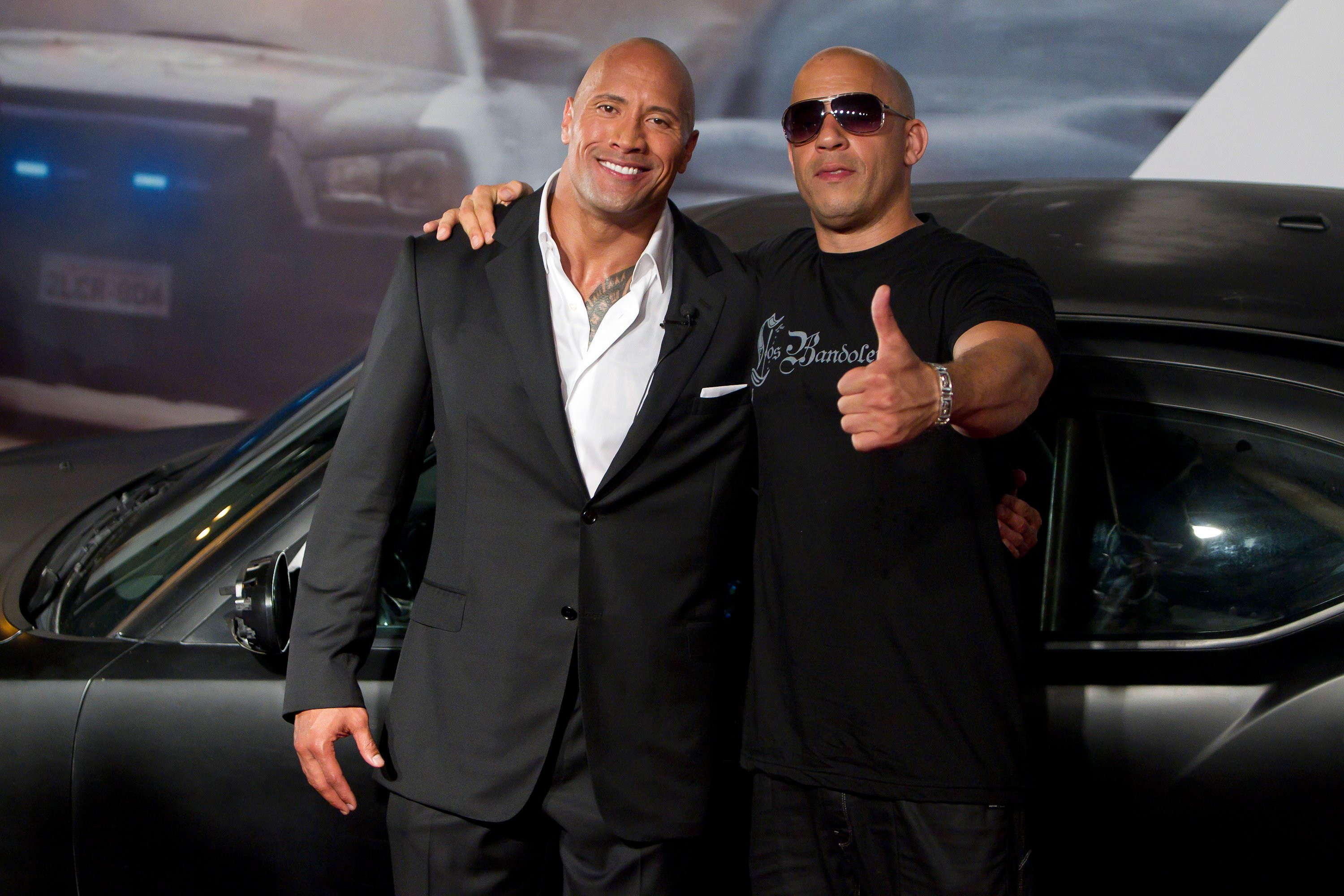 Dwayne Johnson and Vin Diesel pose for photographers during the premiere of the movie "Fast and Furious 5"