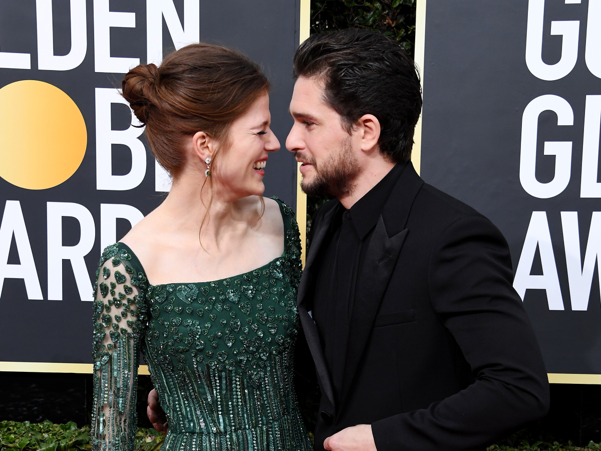 Rose Leslie and Kit Harington stare into each other’s eyes as they attend the 77th Annual Golden Globe Awards at The Beverly Hilton Hotel in 2020.
