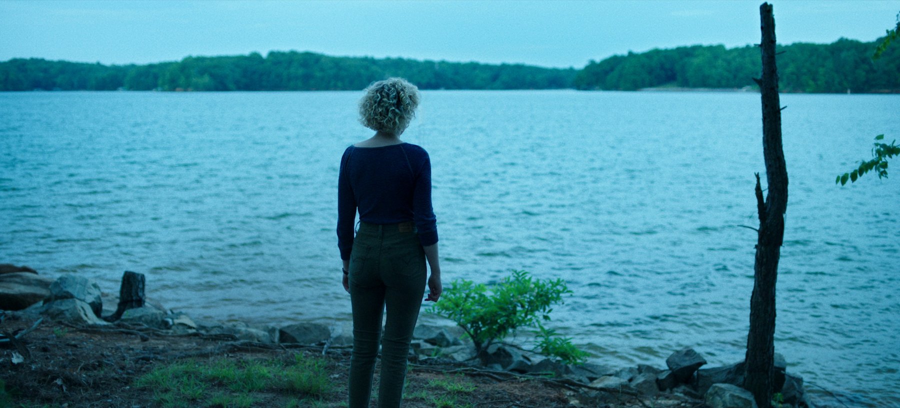 Ruth Langmore (Julia Garner) looks out over the lake in 'Ozark's final season