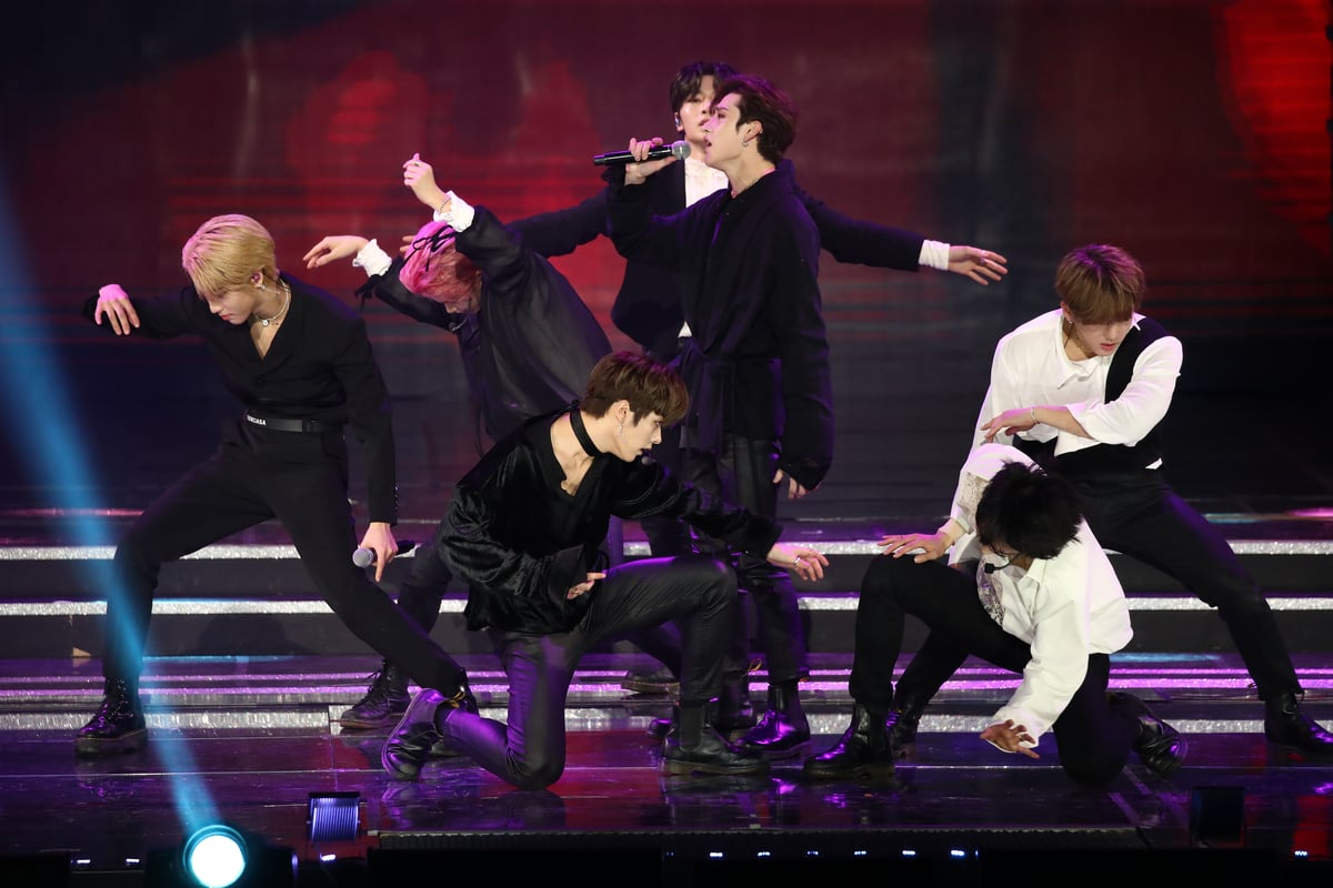 Wearing black and white Stray Kids perform at the Gaon Chart K-pop Awards in Seoul, South Korea. 