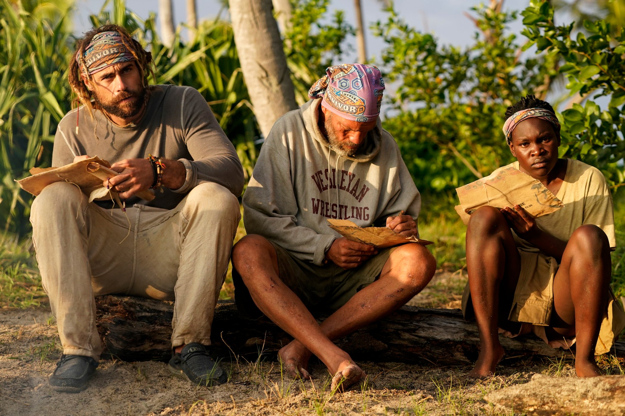 Jonathan Young, Mike Turner, and Maryanne Oketch sitting together in 'Survivor' Season 42