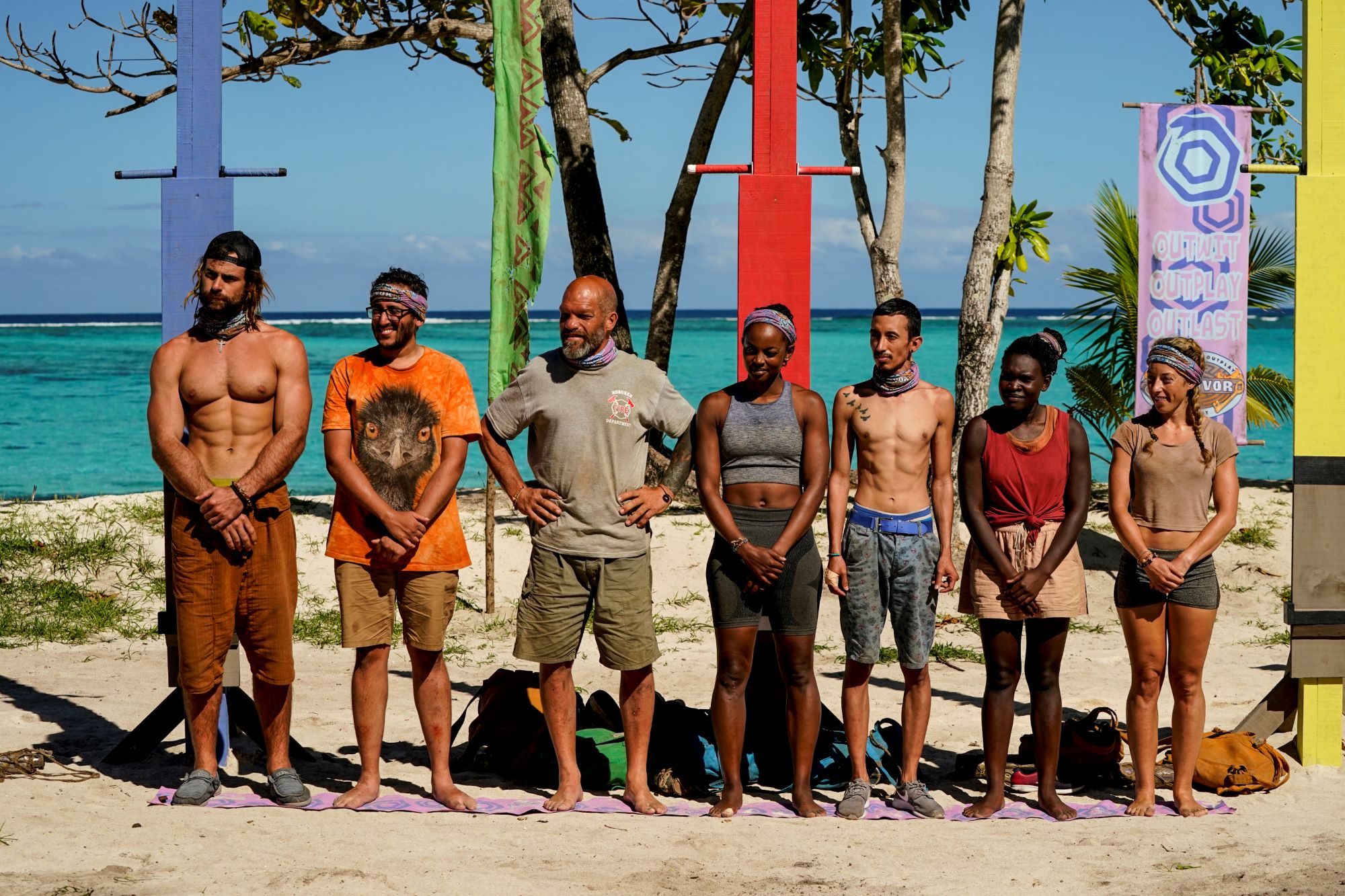 The final seven of the 'Survivor' Season 42 cast, including the winner, listen to instructions regarding the next immunity challenge. The remaining castaways include Jonathan Young, Omar Zaheer, Mike Turner, Drea Wheeler, Romeo Escobar, Maryanne Oketch, and Lindsay Dolashewich.