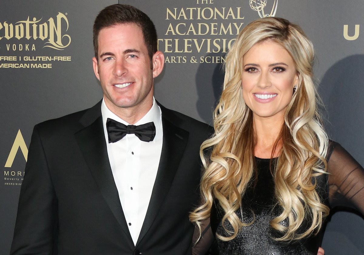 Tarek El Moussa and Christina Haack, who said the split created a 'difficult' situation with her parents, smile on the red carpet