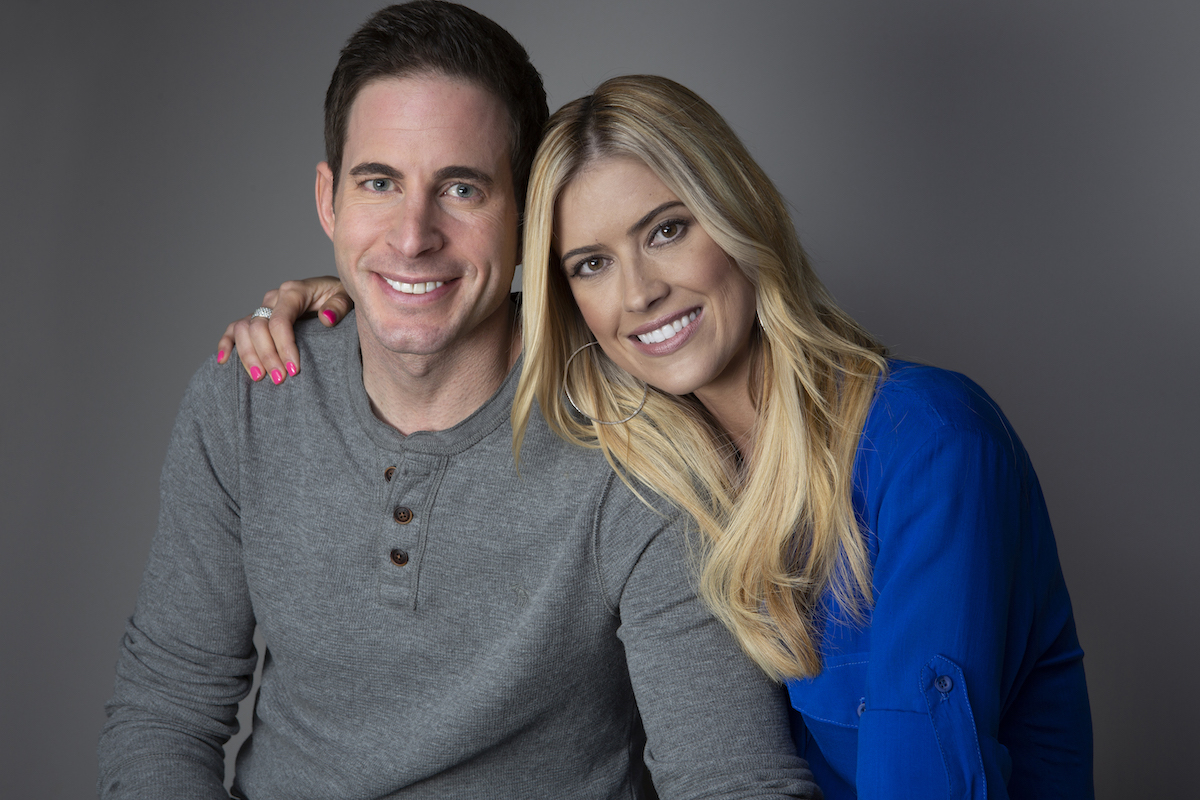 Tarek El Moussa and Christina Haack smile and pose for a portrait.