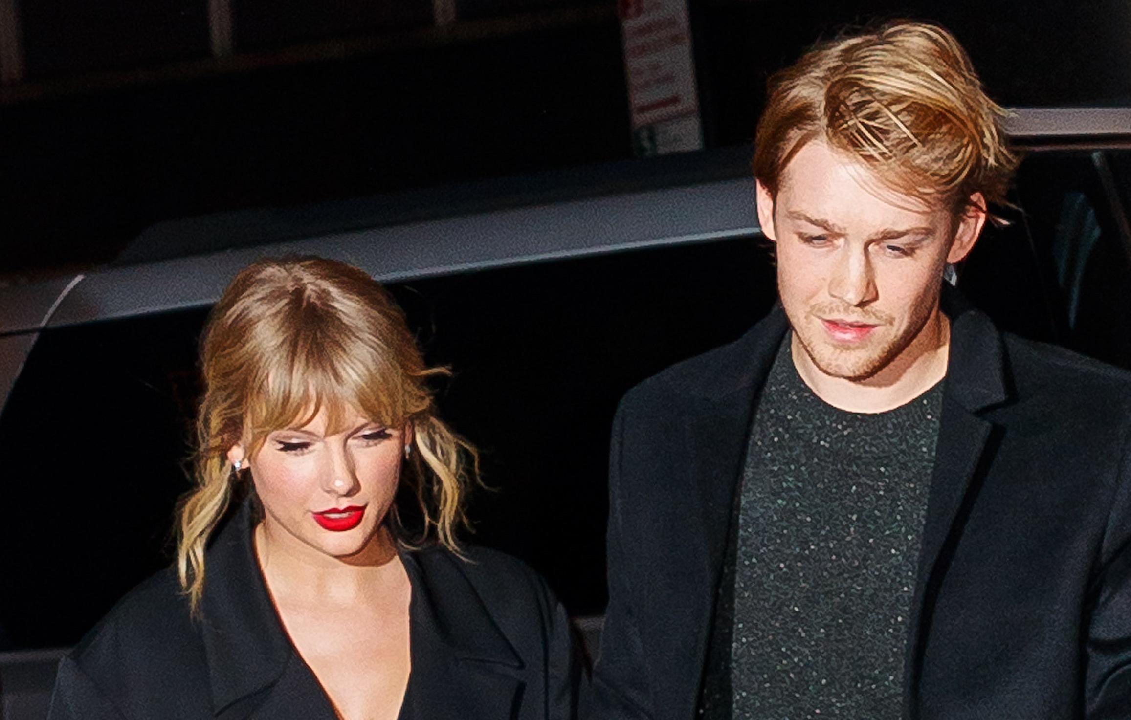 Taylor Swift and Joe Alwyn walk together in 2019