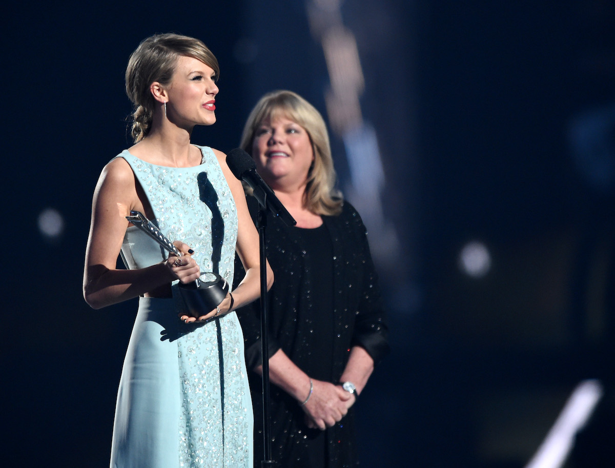 Taylor Swift and her mom Andrea Swift onstage at the CMAs