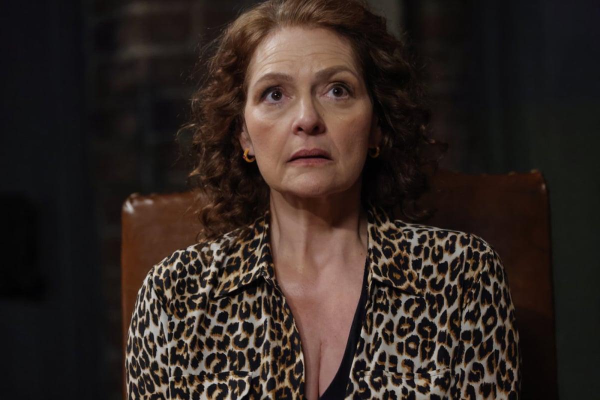 Aida Turturro as Heddie Hawkins in The Blacklist Season 9. Heddie wears an animal print top. 