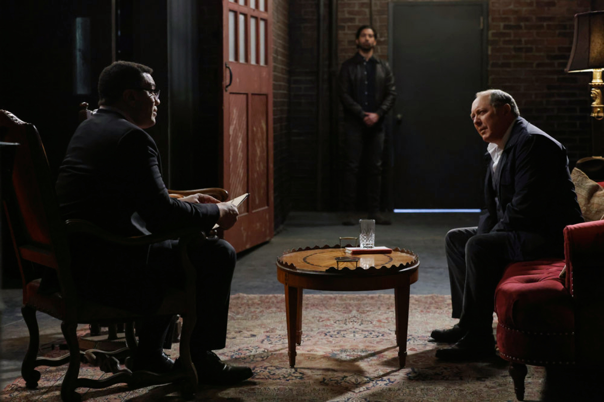 Cooper talks with Red in The Blacklist Season 9 Episode 19. Santiago stands guard. 