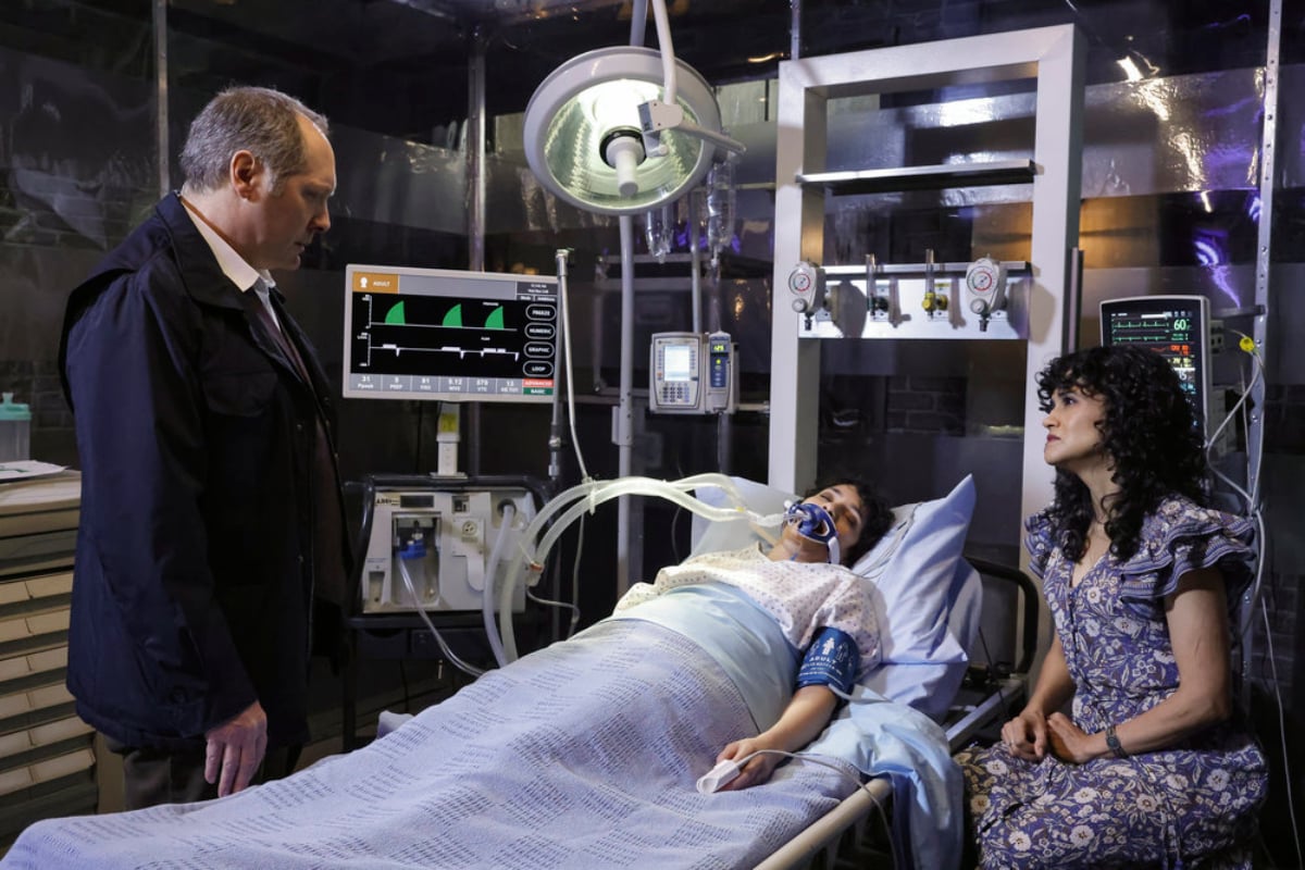 In The Blacklist Season 9 Episode 21, Red and Mierce watch over Weecha, who is in a hospital bed.