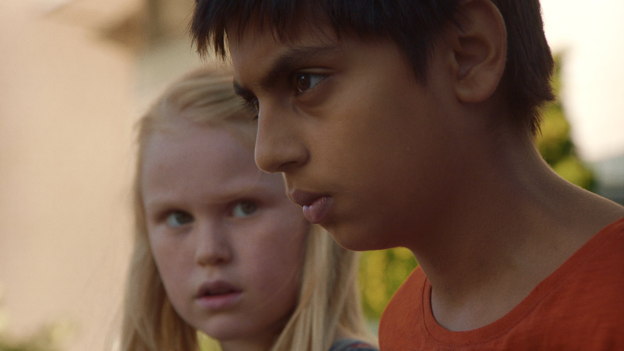 'The Innocents' Rakel Lenora Fløttum as Ida and Sam Ashraf as Ben looking serious with Ida looking at Ben, who is looking straight ahead