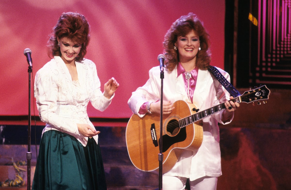 Naomi Judd and Wynonna Judd of The Judds perform on Dick Clark's New Year's Rockin' Eve in 1986 in Times Square, NY.