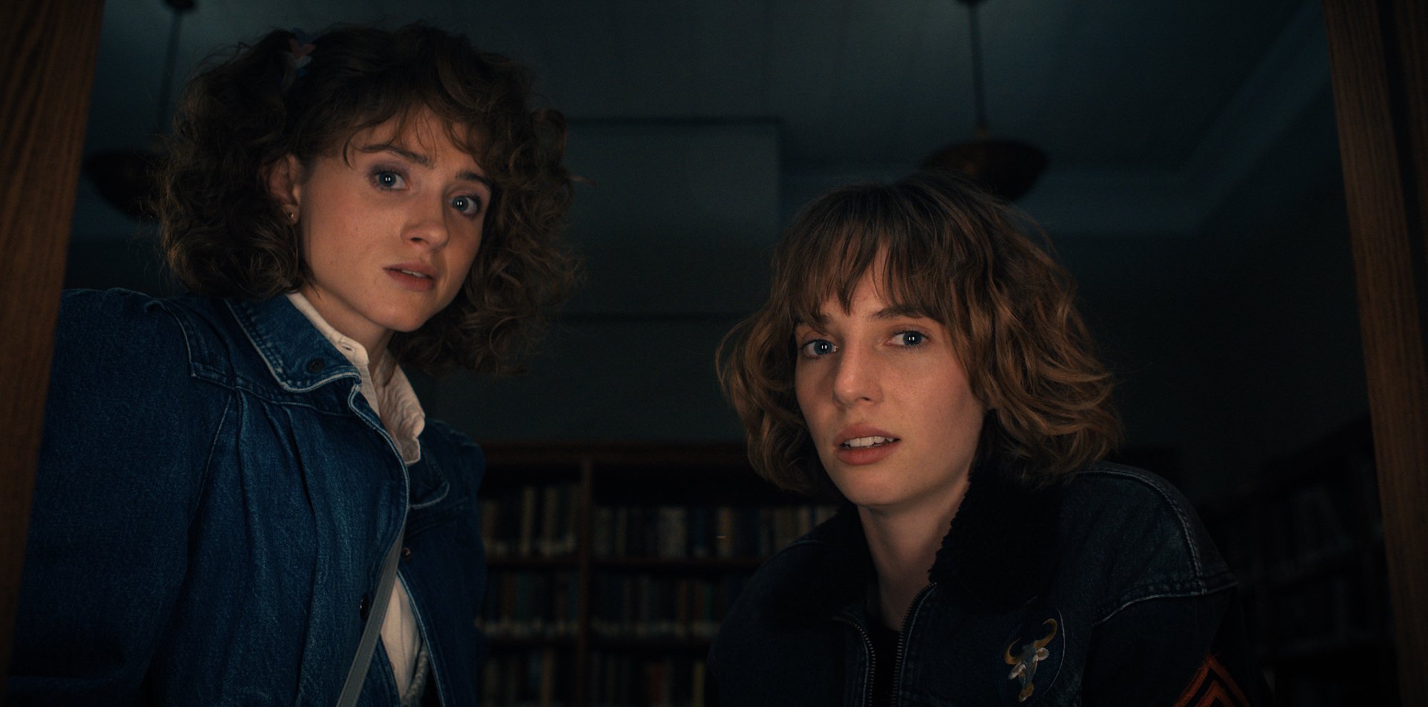 Natalia Dyer as Nancy Wheeler and Maya Hawke as Robin Buckley in a production still from 'The Monster and the Superhero'