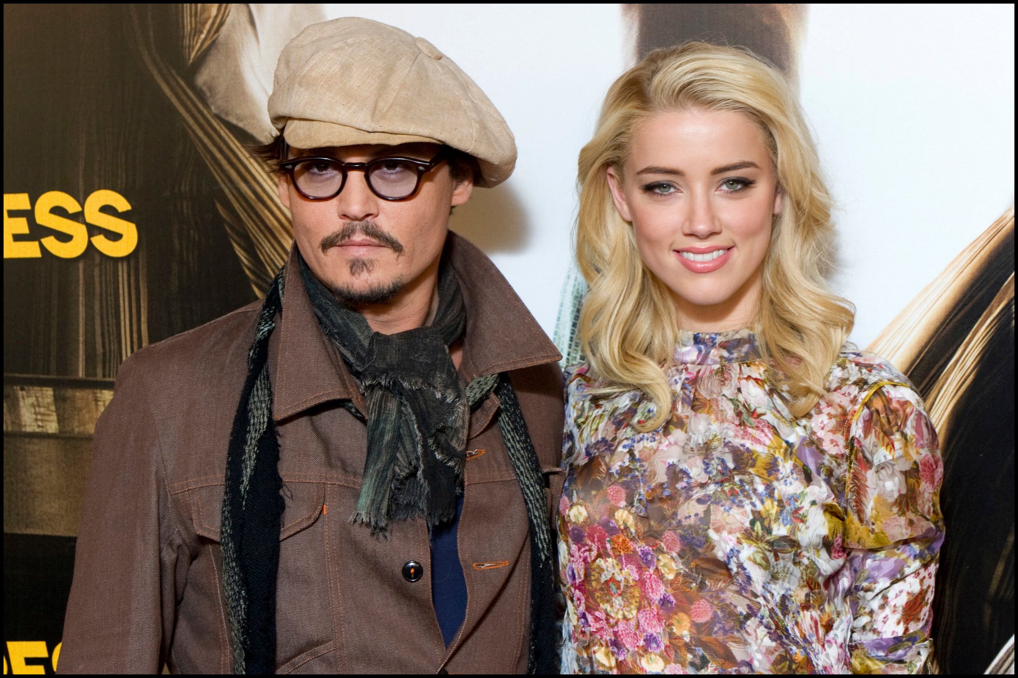 'The Rum Diary' actors Johnny Depp and Amber Heard posing in at the photo call
