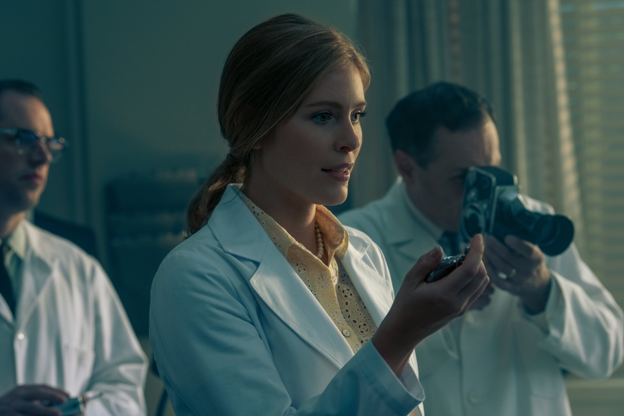 'The Umbrella Academy' character Grace, played by Jordan Claire Robbins, seen here in a production still wearing a lab coat in season 2.