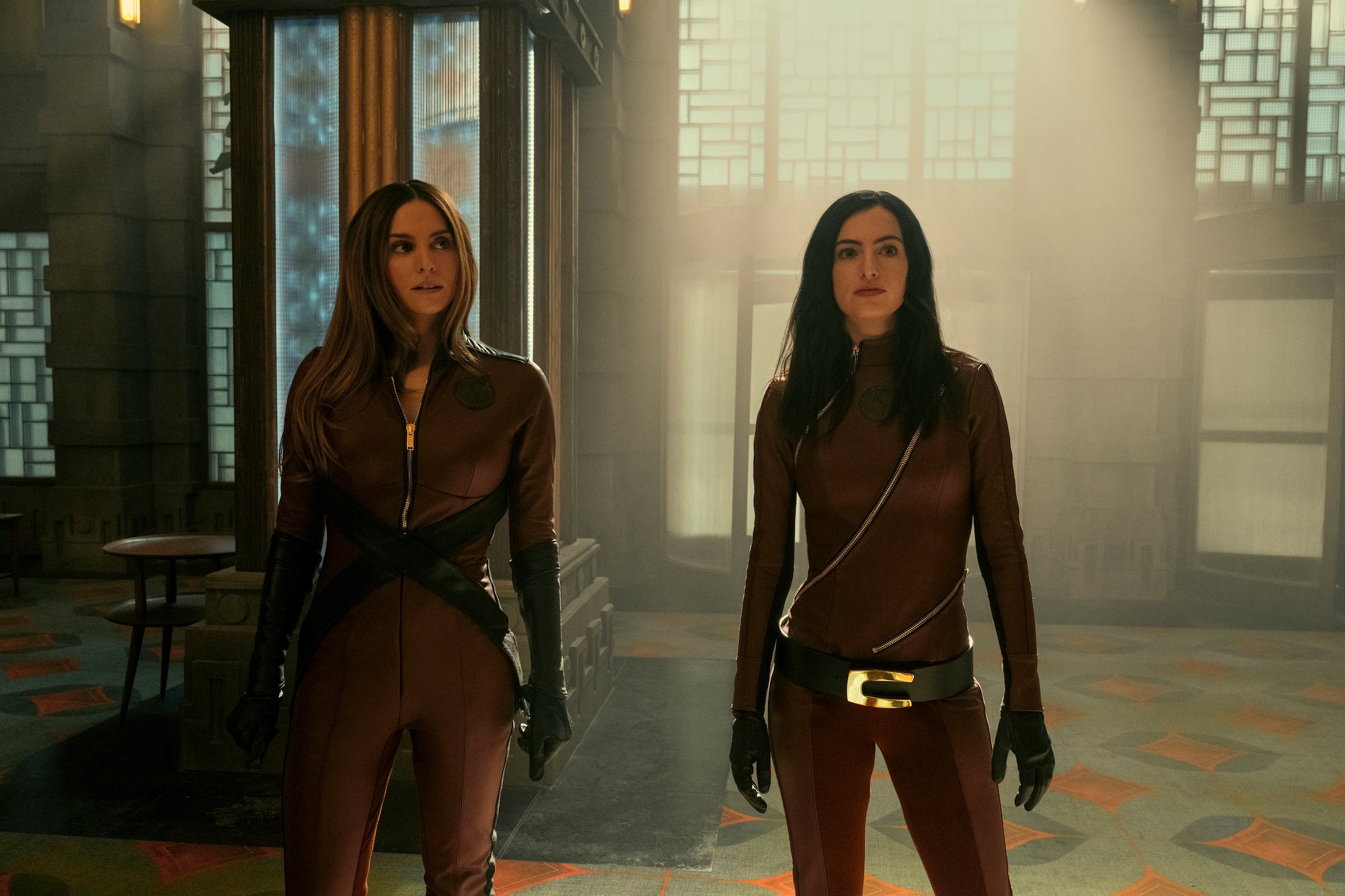 'The Umbrella Academy' Season 3 new images feature Genesis Rodriguez as Sloane and Cazzie David as Jayme in a production still.