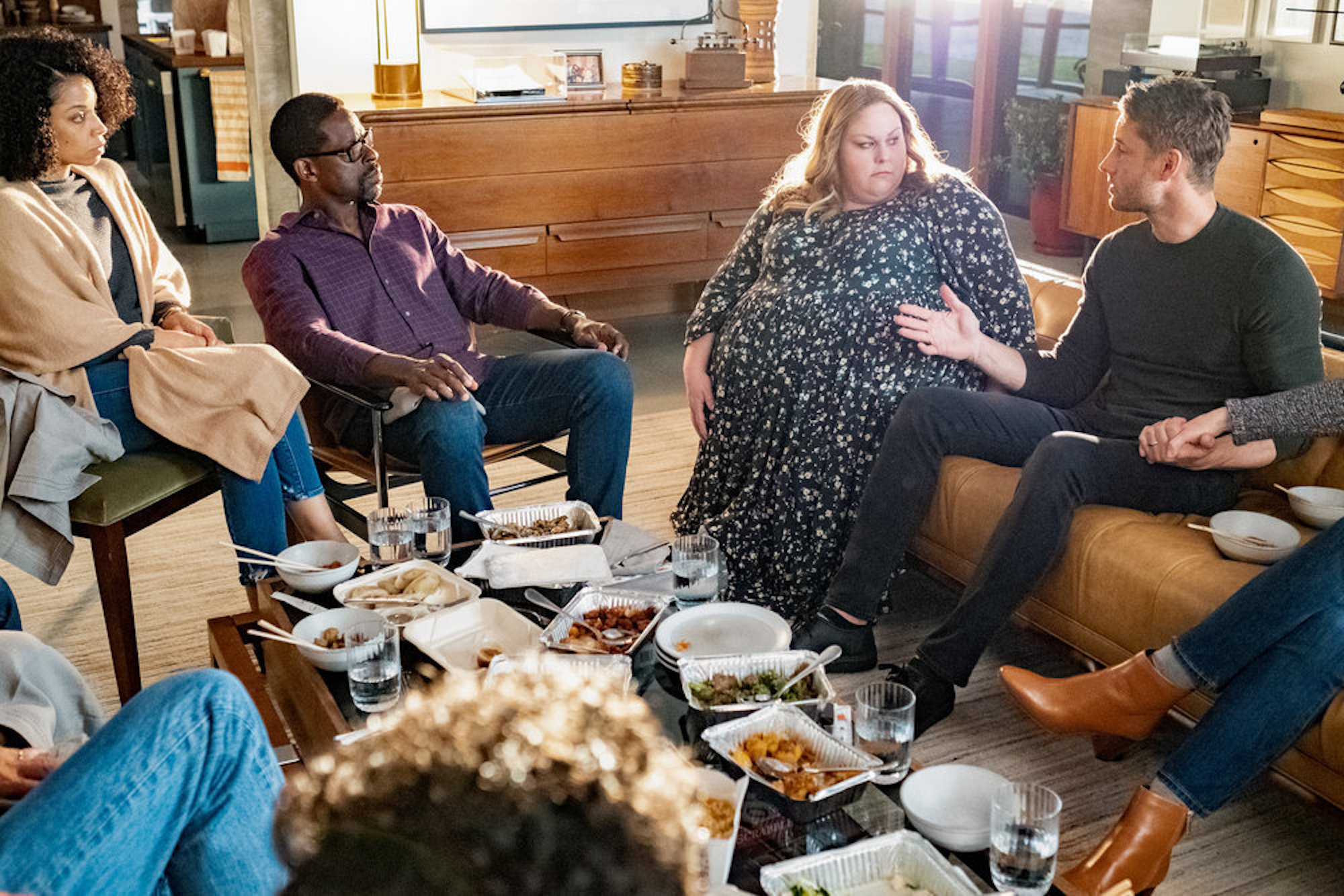 Beth, Randall, Kate, and Kevin sitting together on couches in 'This Is Us' Season 6 Episode 16