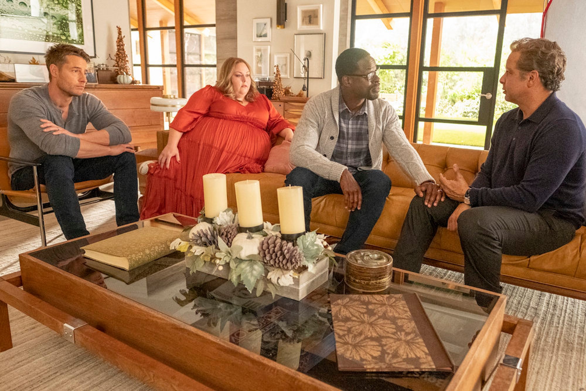 Kevin, Kate, and Randall speaking to Miguel on the couch in 'This Is Us' Season 6 Episode 15