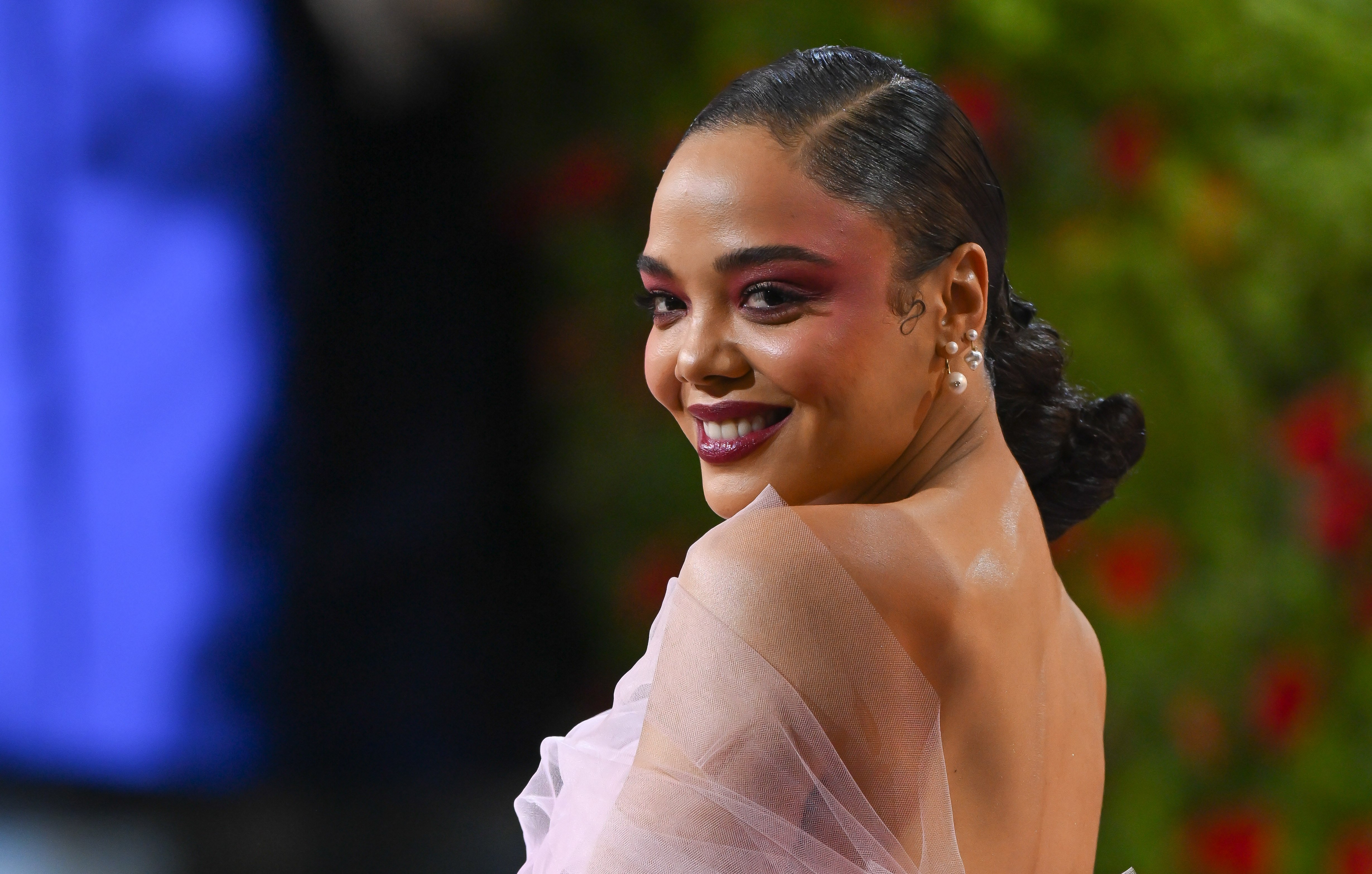Tessa Thompson, who stars as Valkyrie in 'Thor: Love and Thunder,' wears a light pink tulle dress.