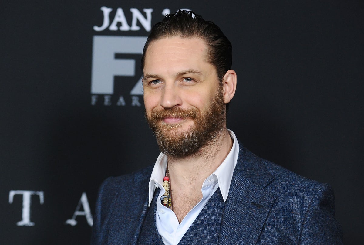 Tom Hardy smirks in a close-up photo as he attends the premiere of "Taboo" at DGA Theater on January 9, 2017, in Los Angeles, California