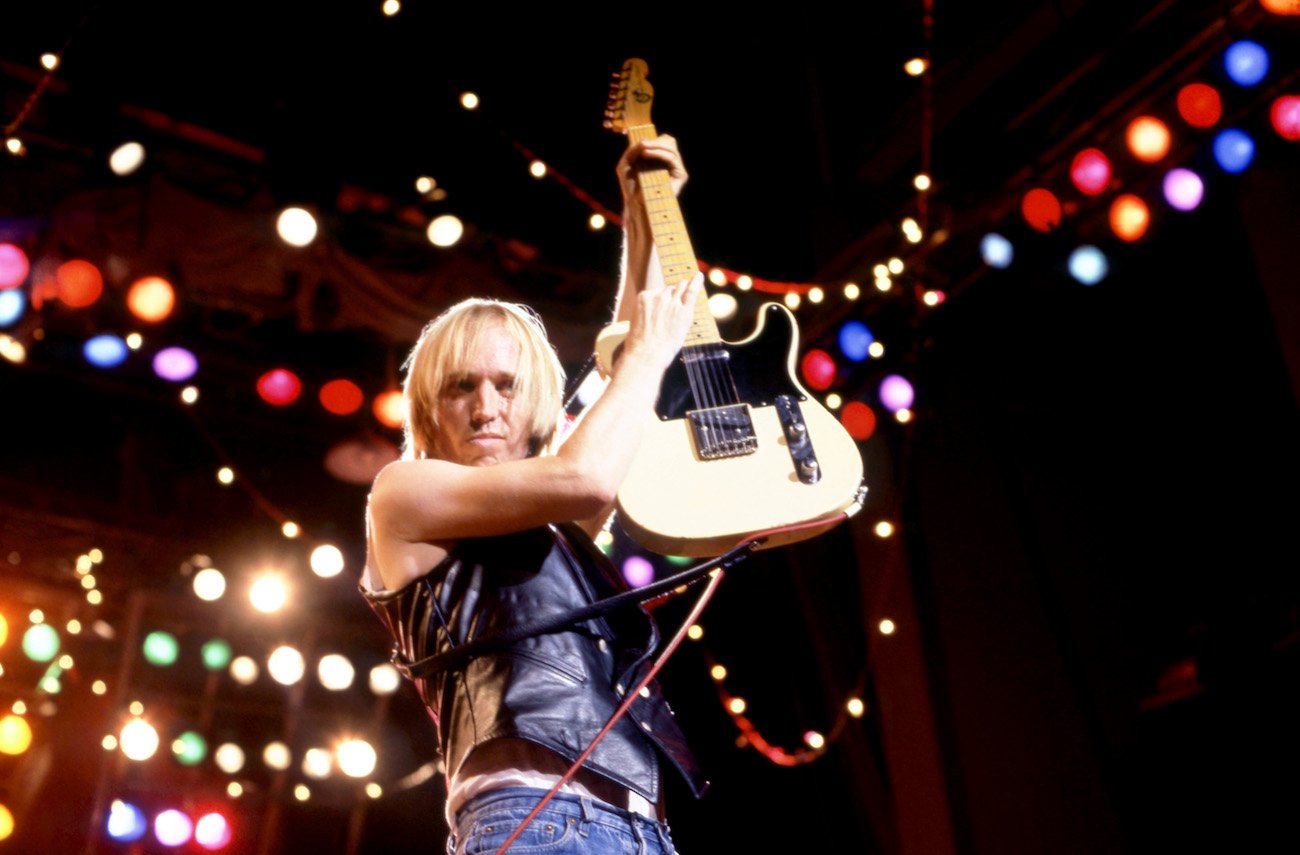 Tom Petty and the Heartbreakers performing during the 1987 Rock 'N' Roll Caravan Tour.