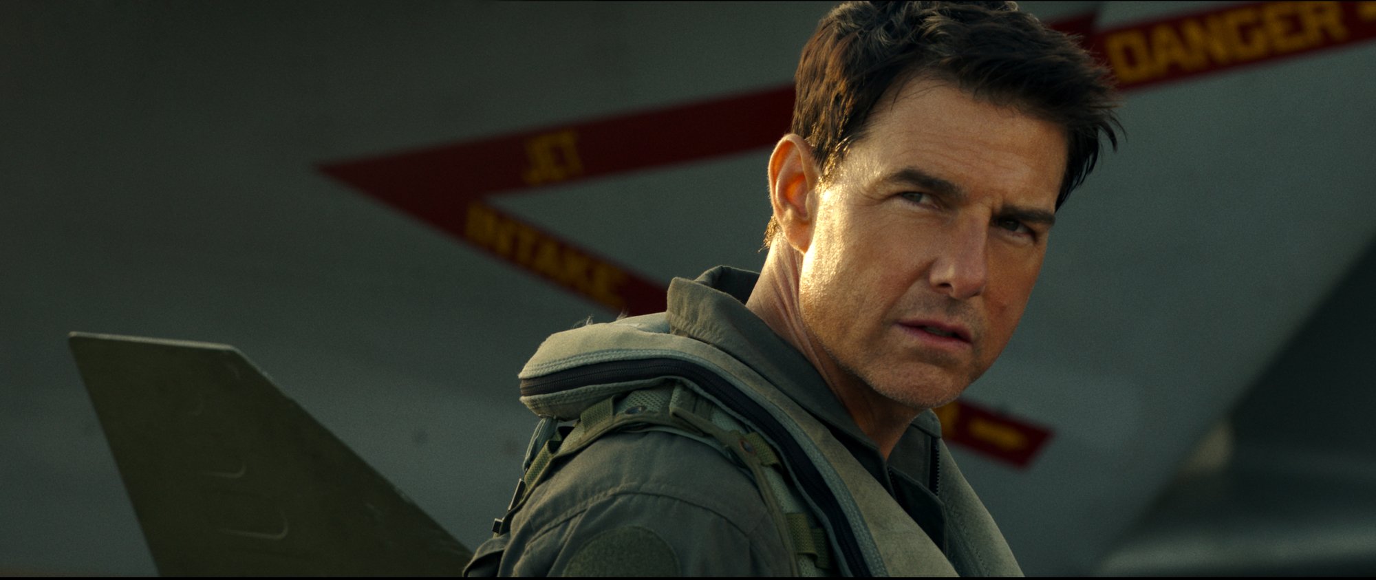 'Top Gun: Maverick' Tom Cruise as Maverick wearing a uniform with a serious look on his face