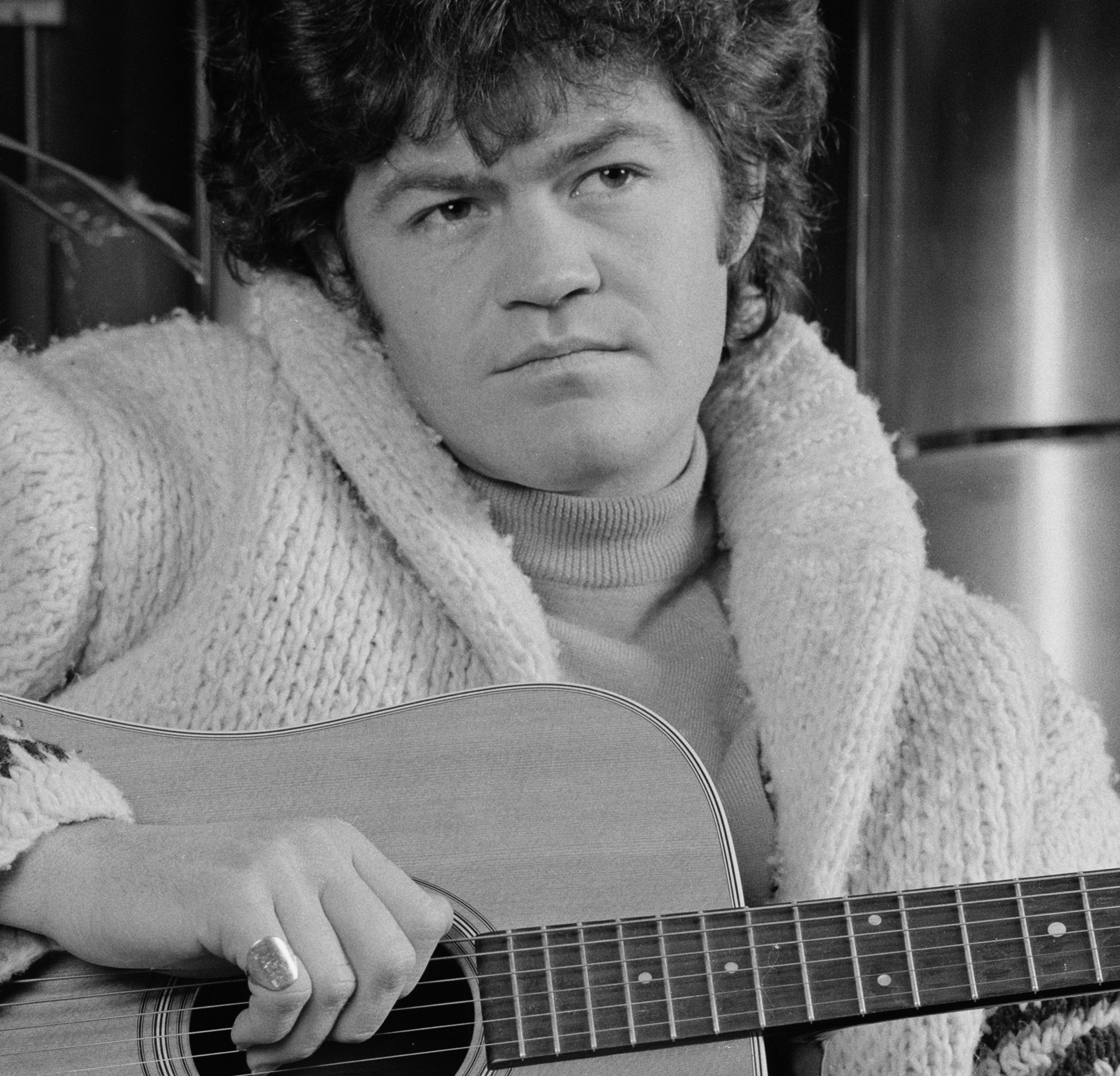 The Monkees' Micky Dolenz with a guitar