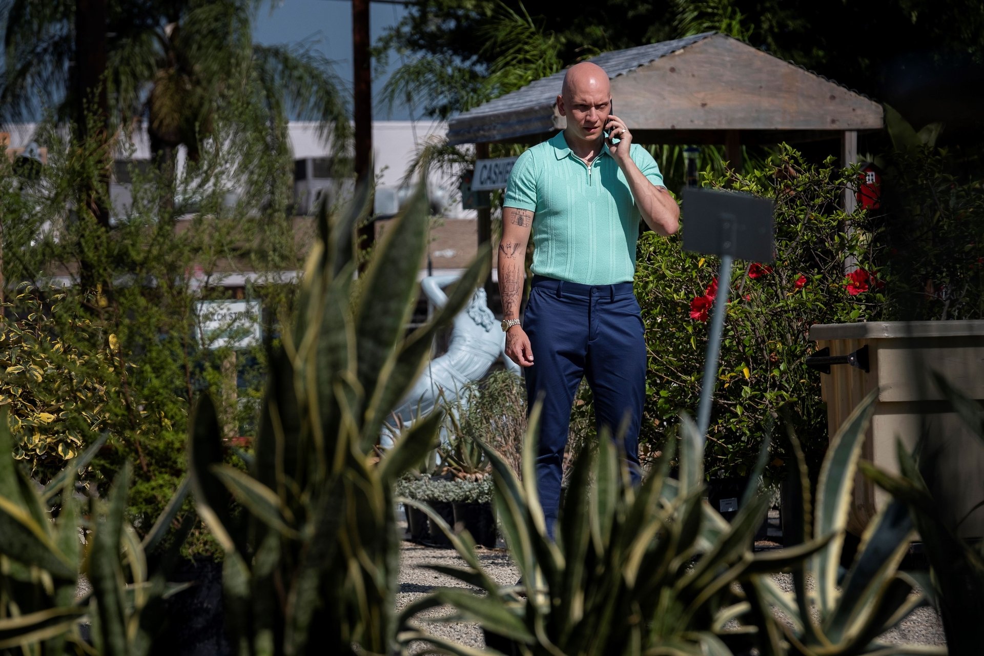 Anthony Carrigan as NoHo Hank talks on his phone in season 3 of 'Barry'