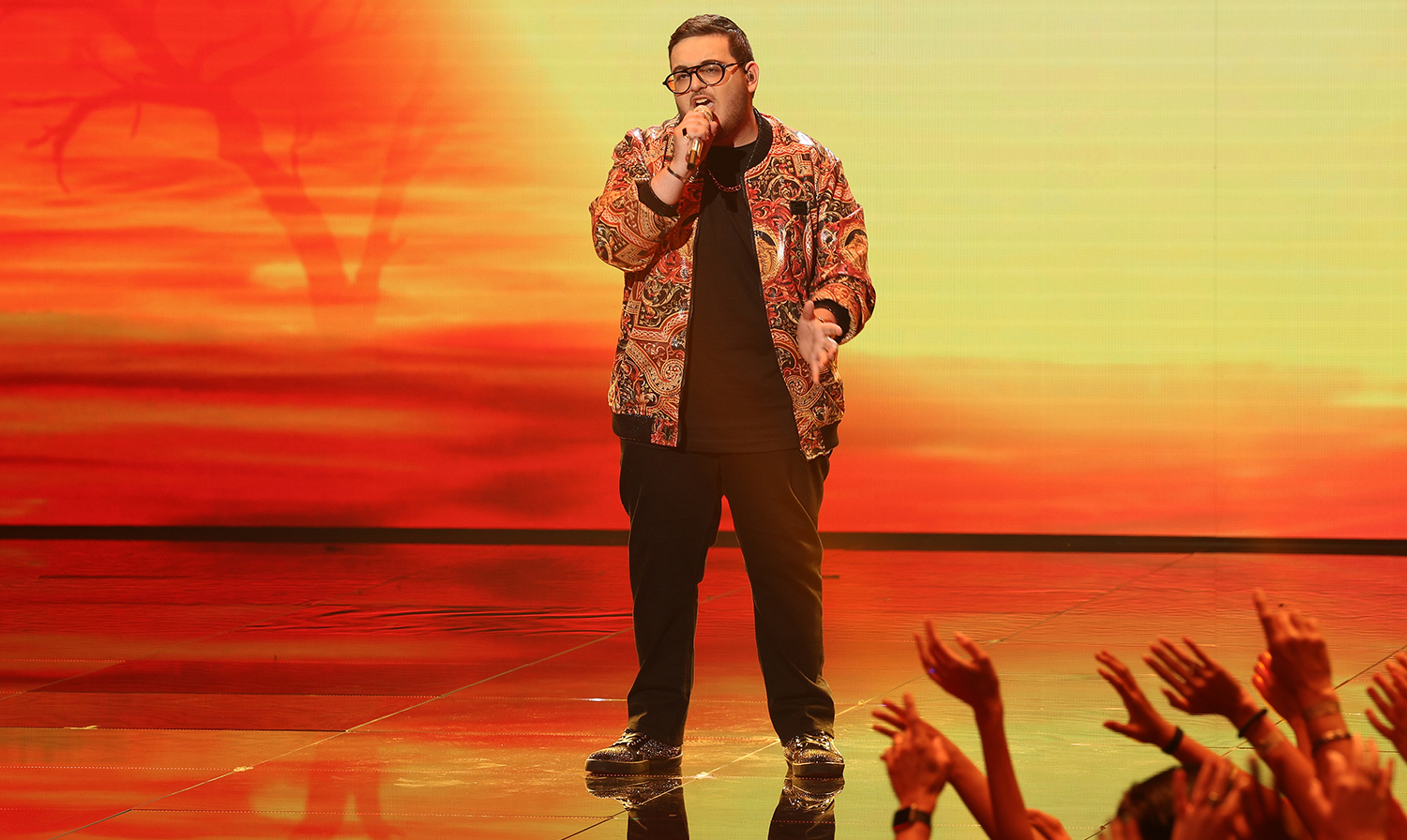 Christian Guardino performs on Disney Night on American Idol 2022 before making it to the Top 7.