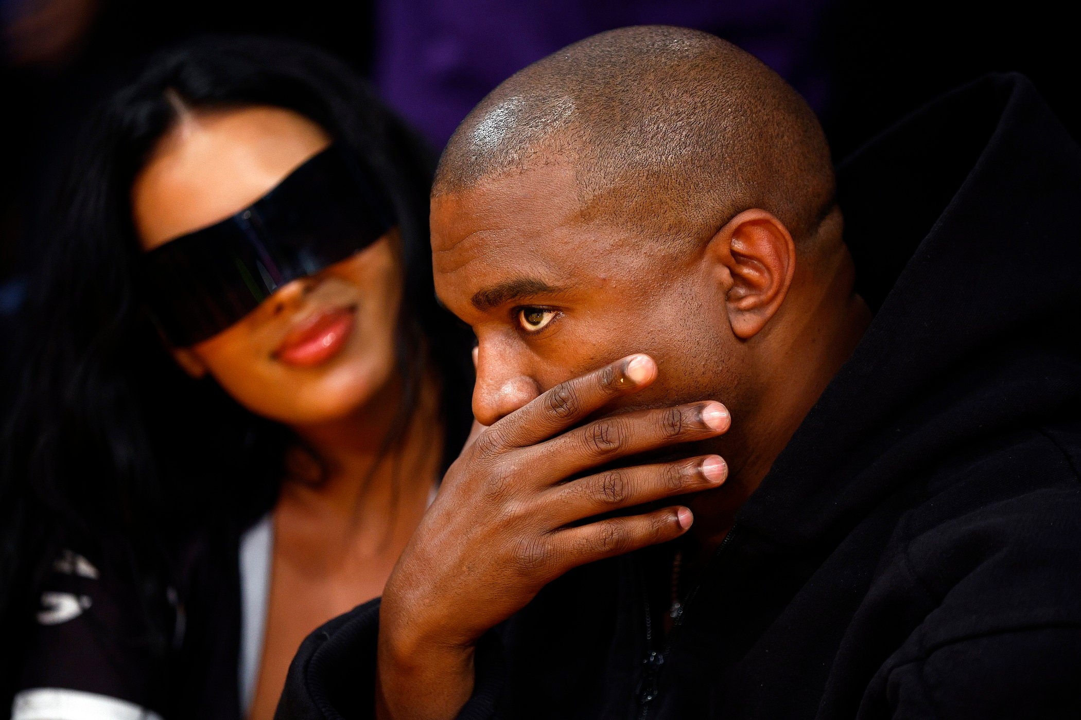 Billionaire Kanye West deep in thought at the Lakers Wizards game