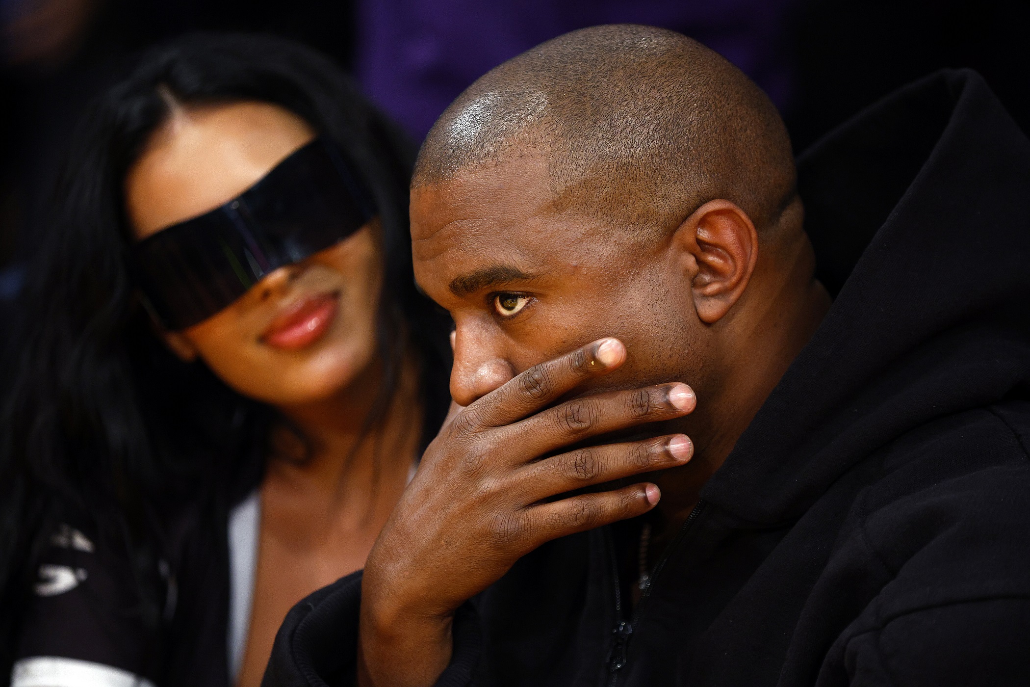 Billionaire Kanye West deep in thought at the Lakers Wizards game