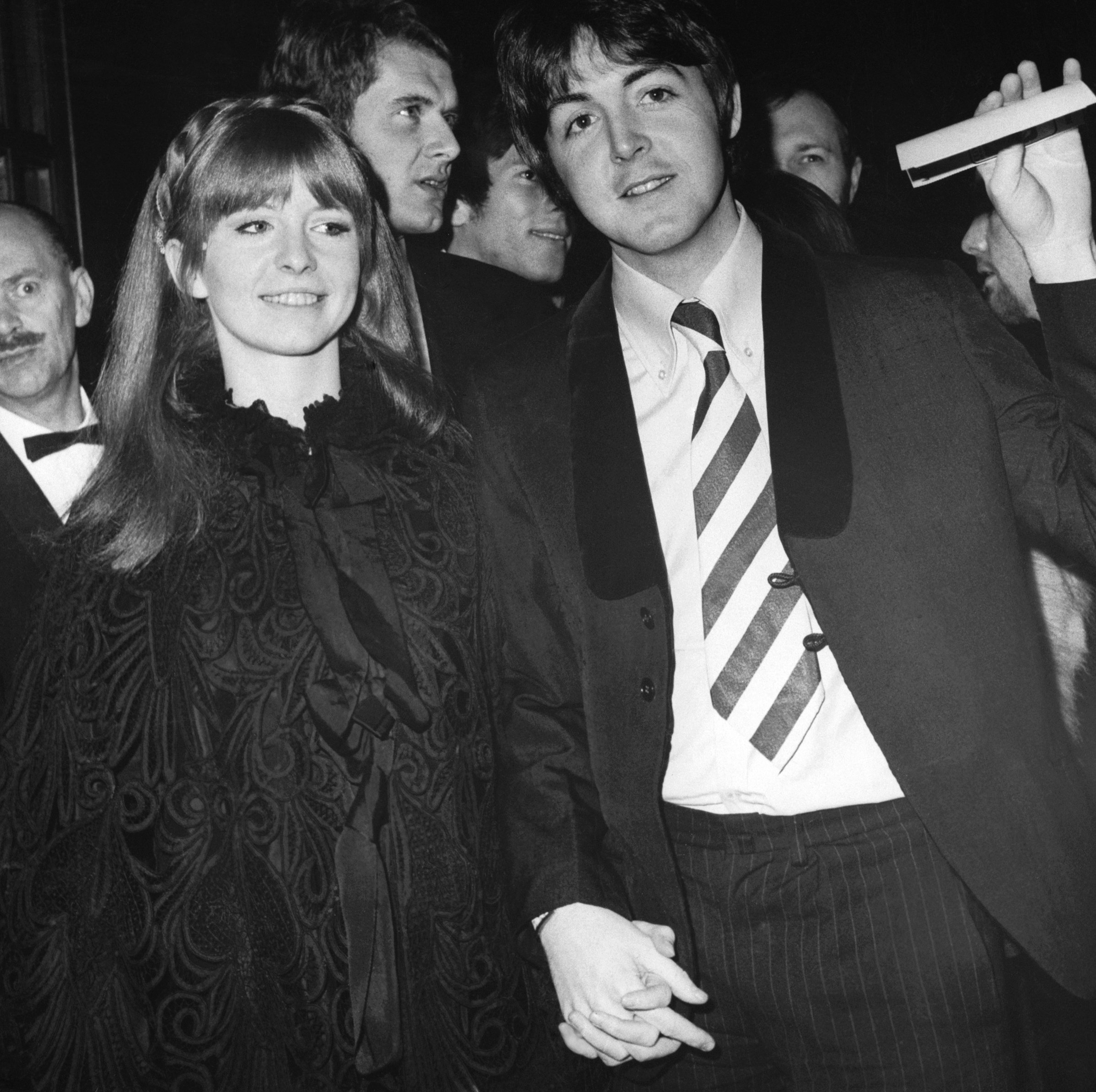 Jane Asher and Paul McCartney holding hands
