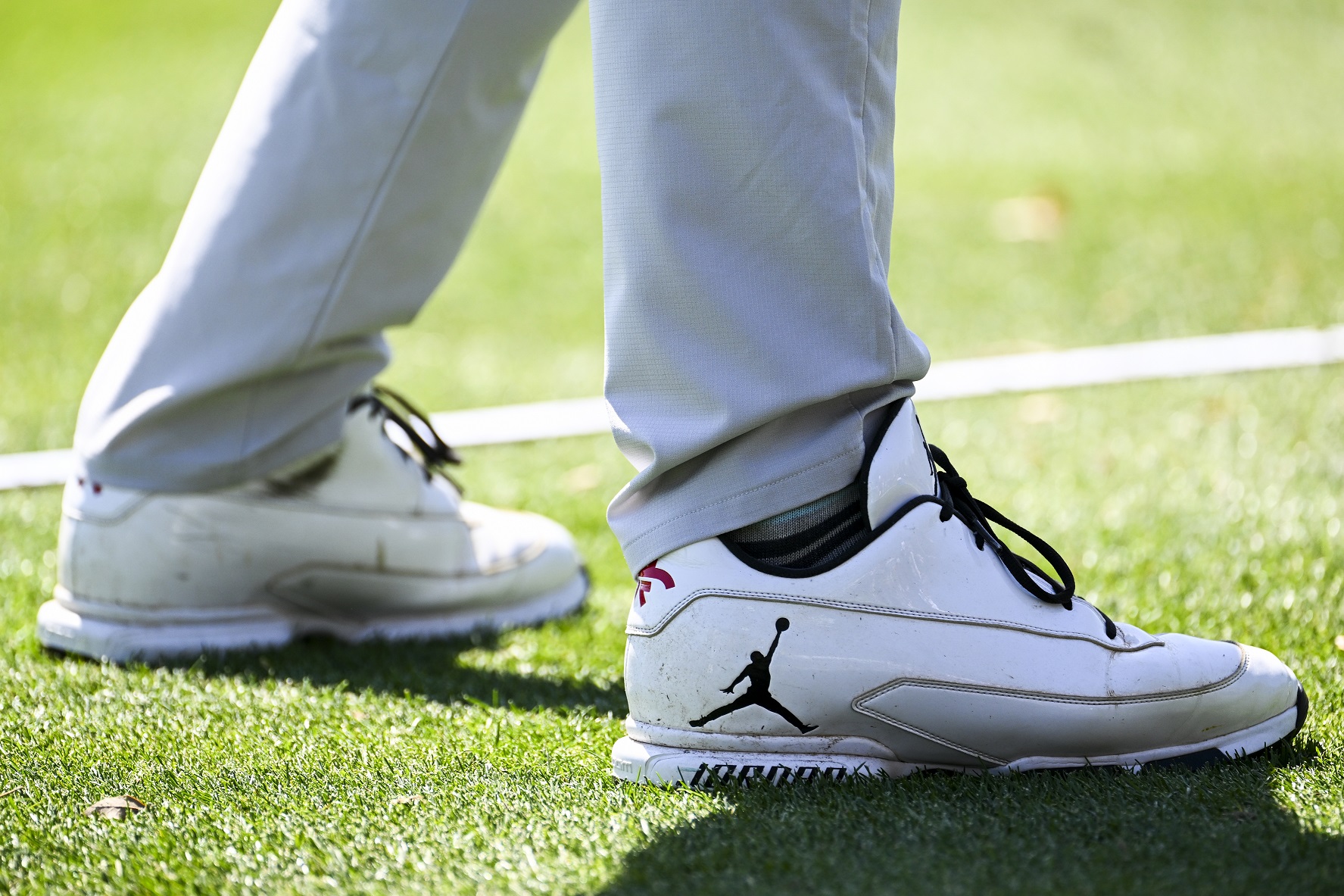 Kanye West vs Michael Jordan with Air Jordans on the feet of Keegan Bradley