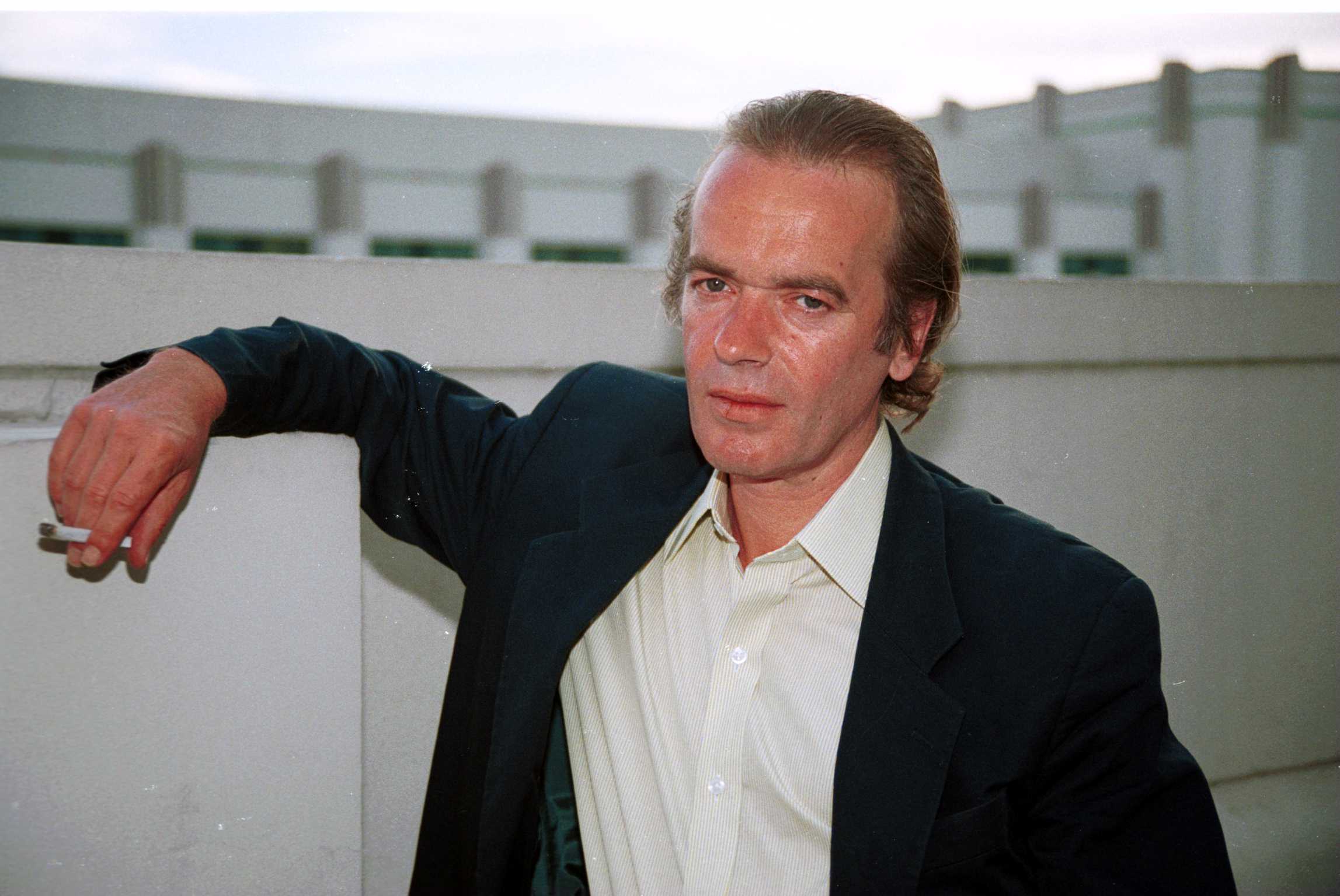 'London Fields' author Martin Amis wearing a suit